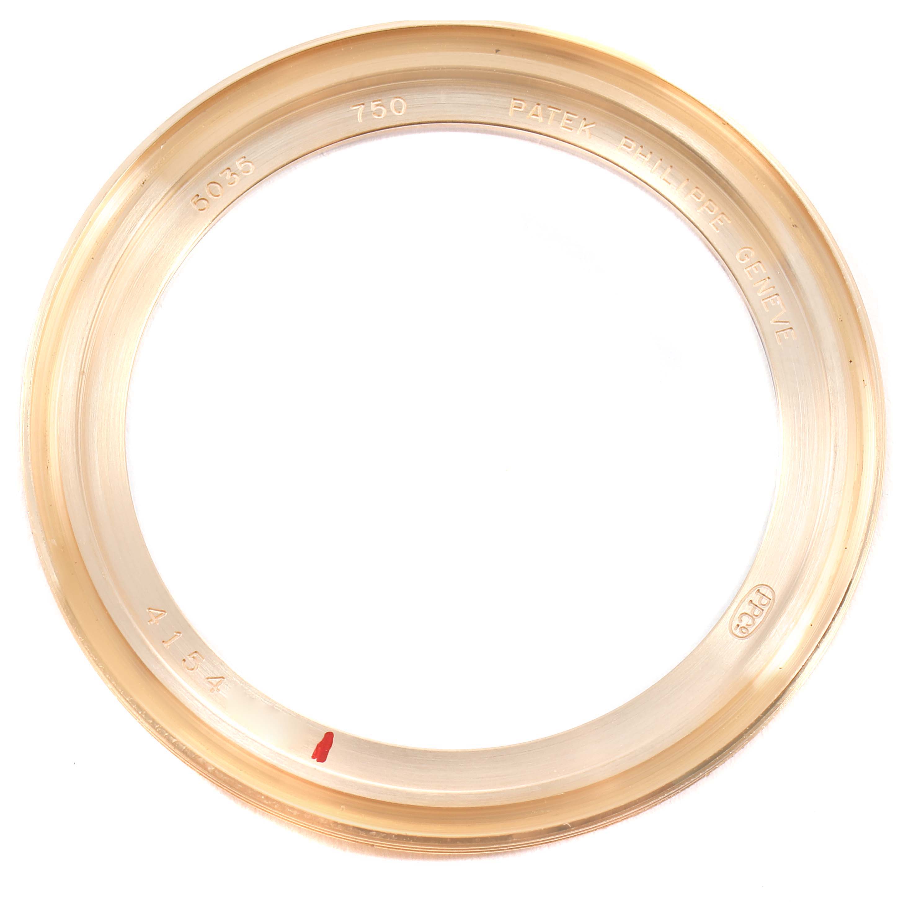 This image shows the rose gold bezel from the Patek Philippe Complications 5035R Men's Rose Gold Silver Dial 5035R Men's Rose Gold Silver Dial model, viewed from above.