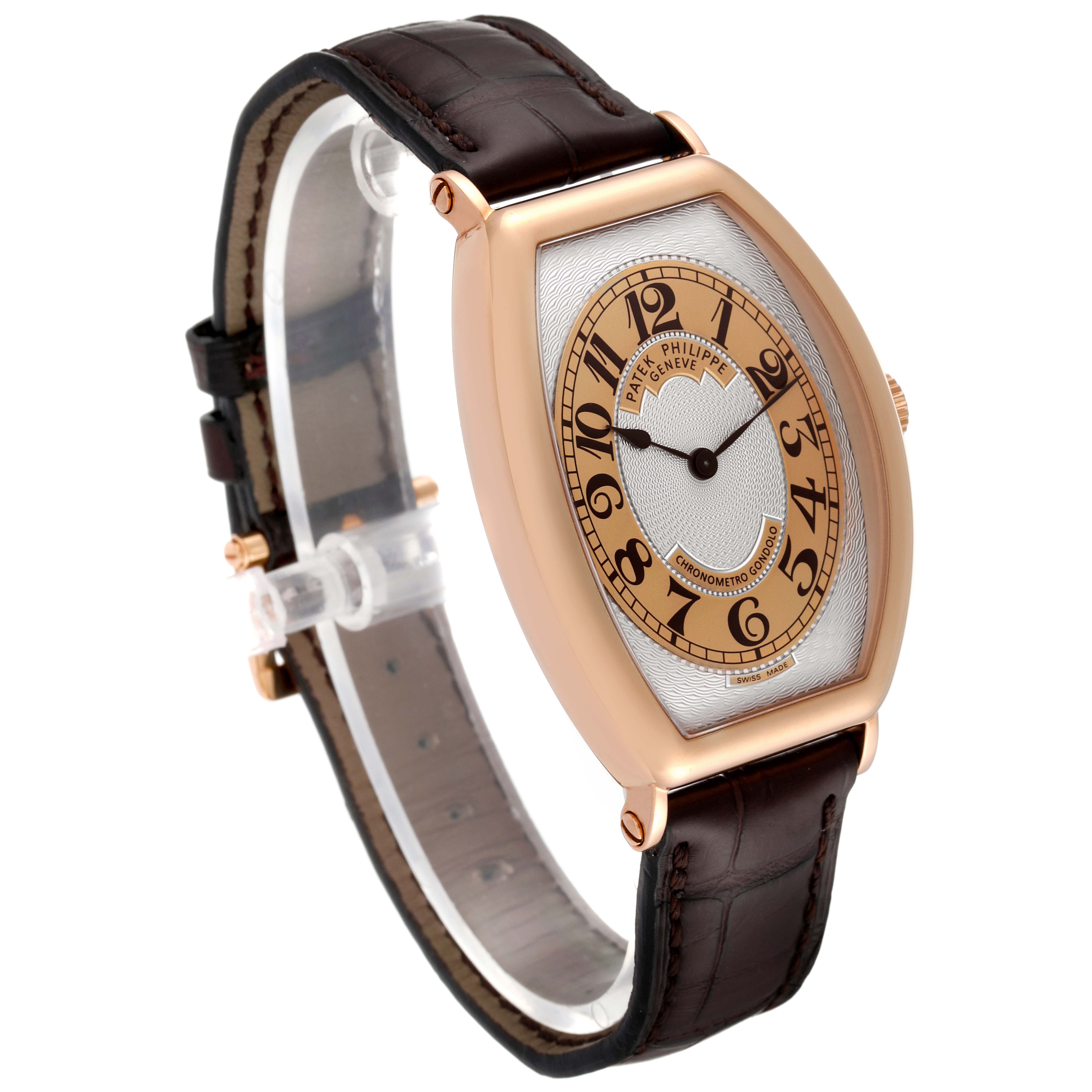 The Patek Philippe Gondolo 5098R Men's Rose Gold Silver Dial 5098R Men's Rose Gold Silver Dial watch is shown at a three-quarter angle highlighting its face, case, and leather strap.