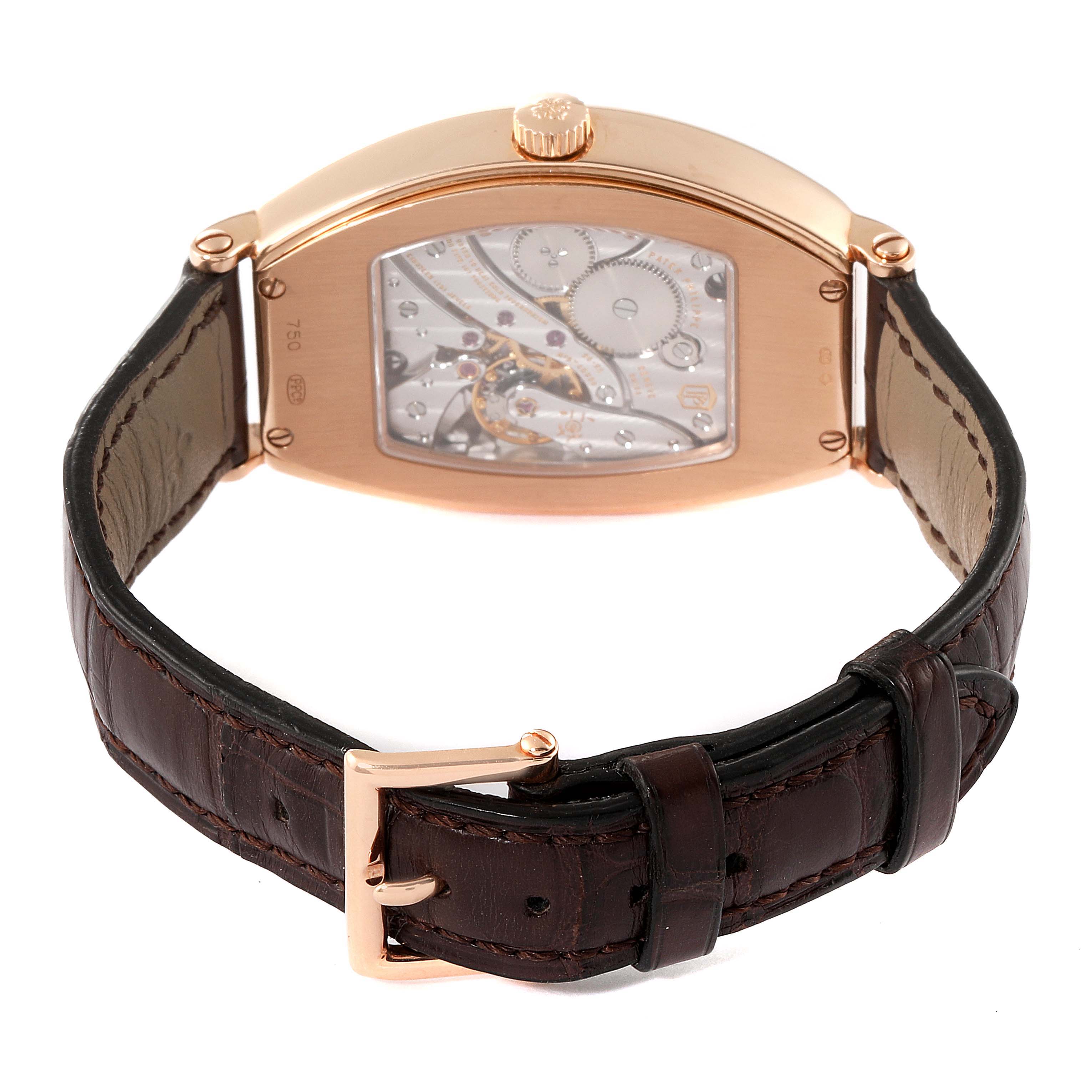 The photo shows the back view of the Patek Philippe Gondolo 5098R Men's Rose Gold Silver Dial 5098R Men's Rose Gold Silver Dial watch, featuring its movement and brown leather strap with a buckle.