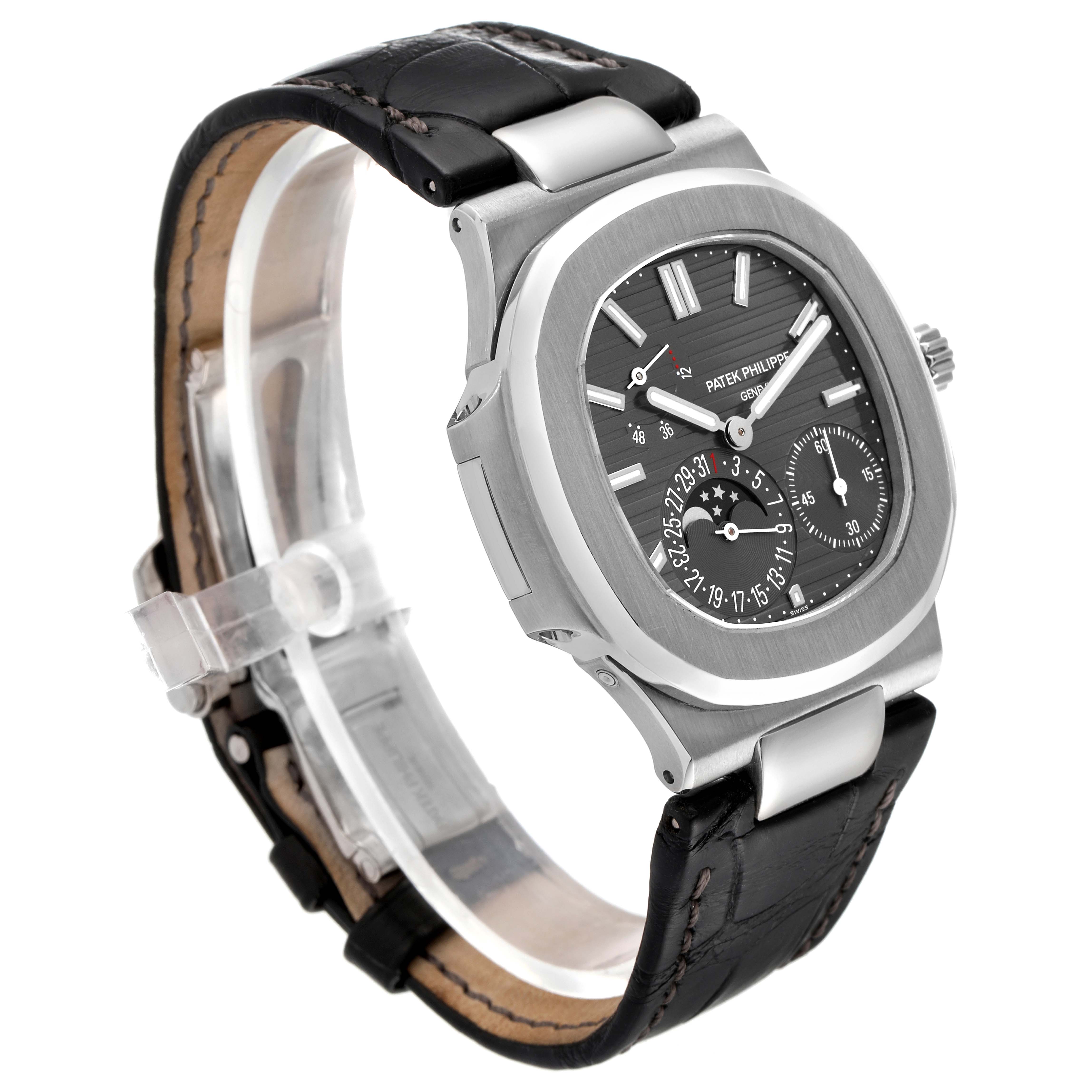 The image shows a Patek Philippe Nautilus 5712G/001 Men
s White Gold Grey Dial 5712G/001 Men
s White Gold Grey Dial watch at a three-quarter angle, highlighting the dial, casing, and leather strap.