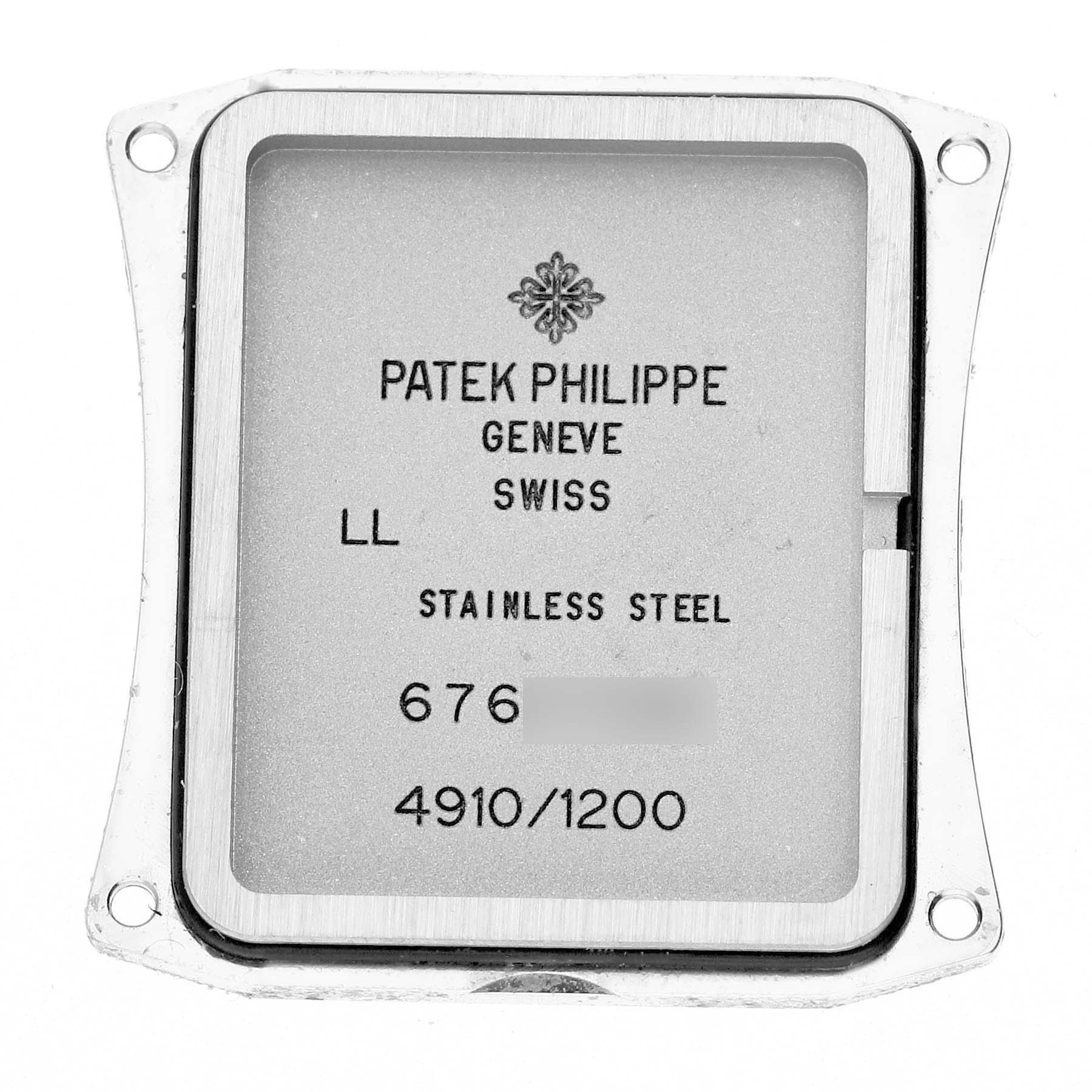 The image shows the back casing of a Patek Philippe Twenty-4 4910 Women's Stainless Steel Blue Dial watch with brand engravings and model details.
