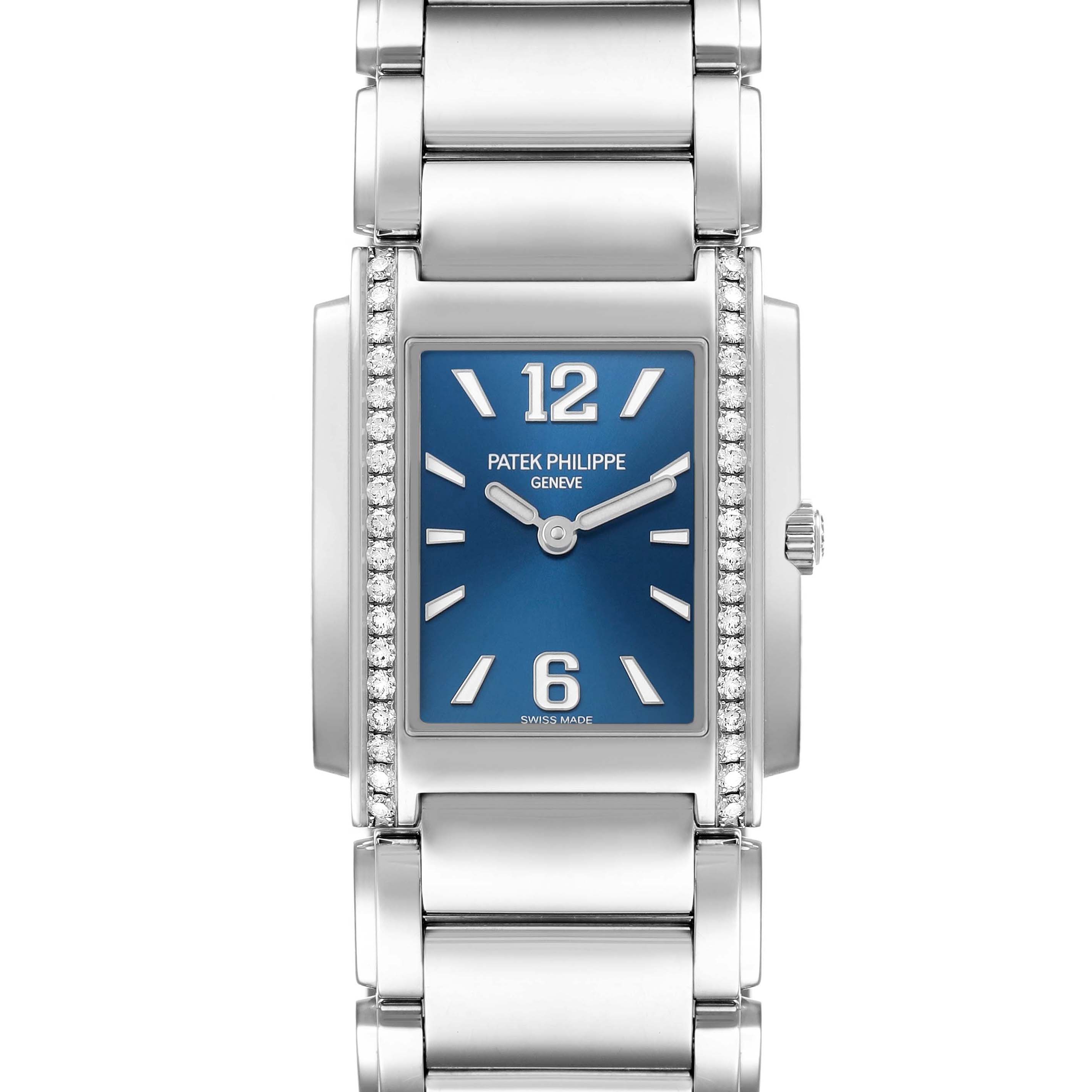 The Patek Philippe Twenty-4 4910 Women's Stainless Steel Blue Dial watch is shown from a top view, highlighting the face, bracelet, and diamond accents.