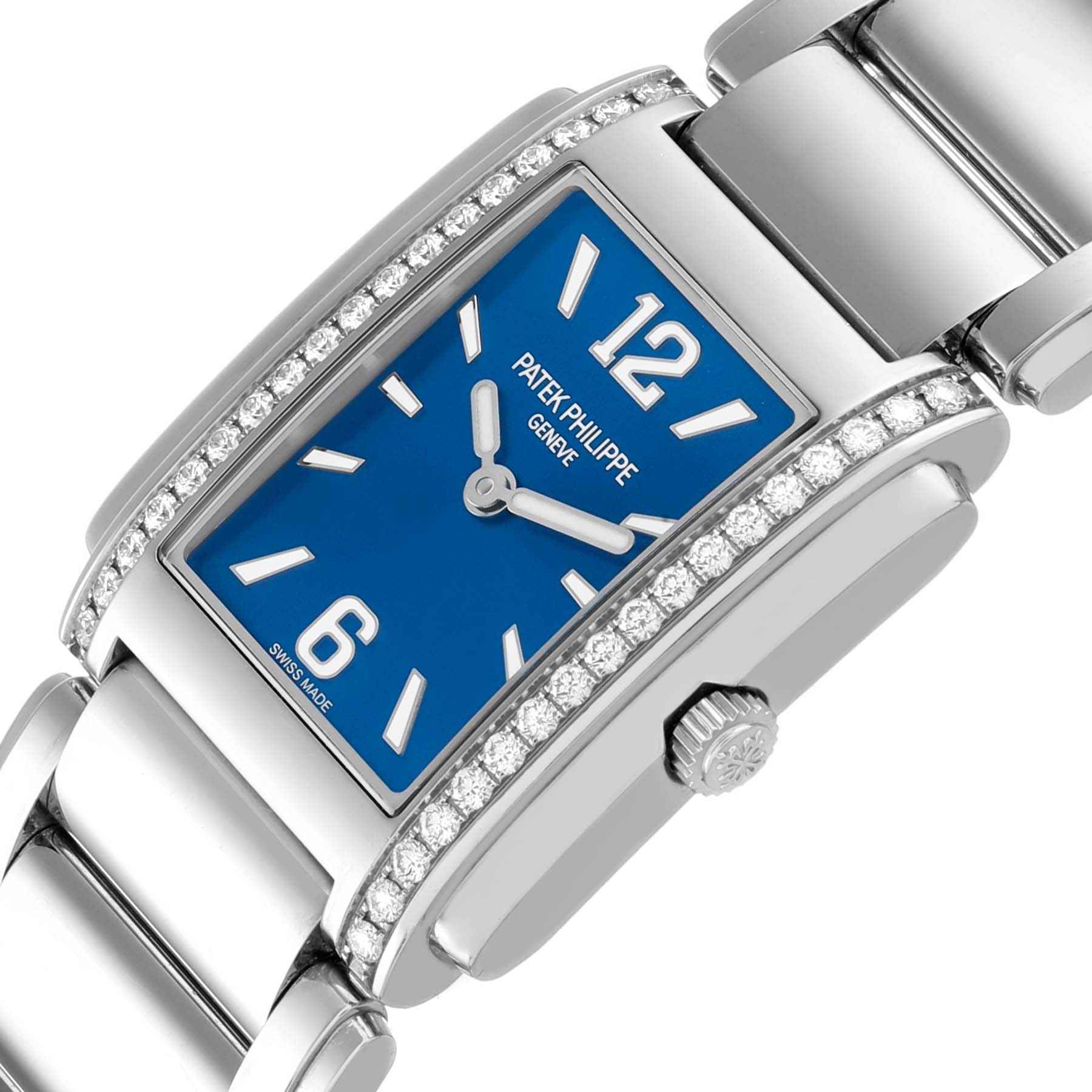 The Patek Philippe Twenty-4 4910 Women's Stainless Steel Blue Dial watch is shown at an angle highlighting the blue dial, diamond bezel, and bracelet links.