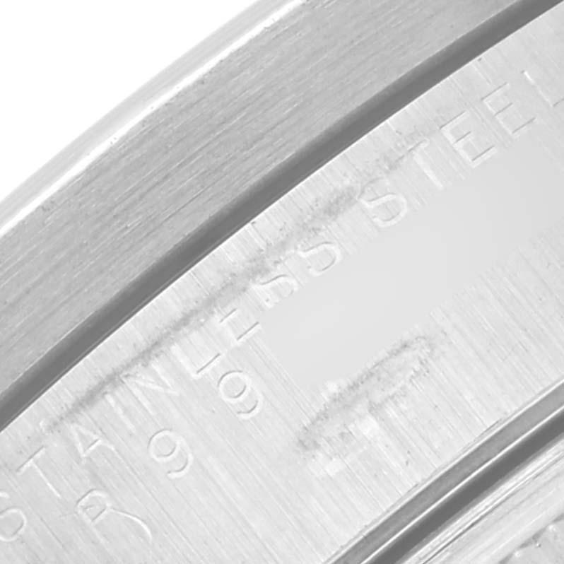 This close-up angle shows a portion of the bezel and case back of the Rolex Air-King 14010M Men's Stainless Steel White Dial 14010M Men's Stainless Steel White Dial watch.