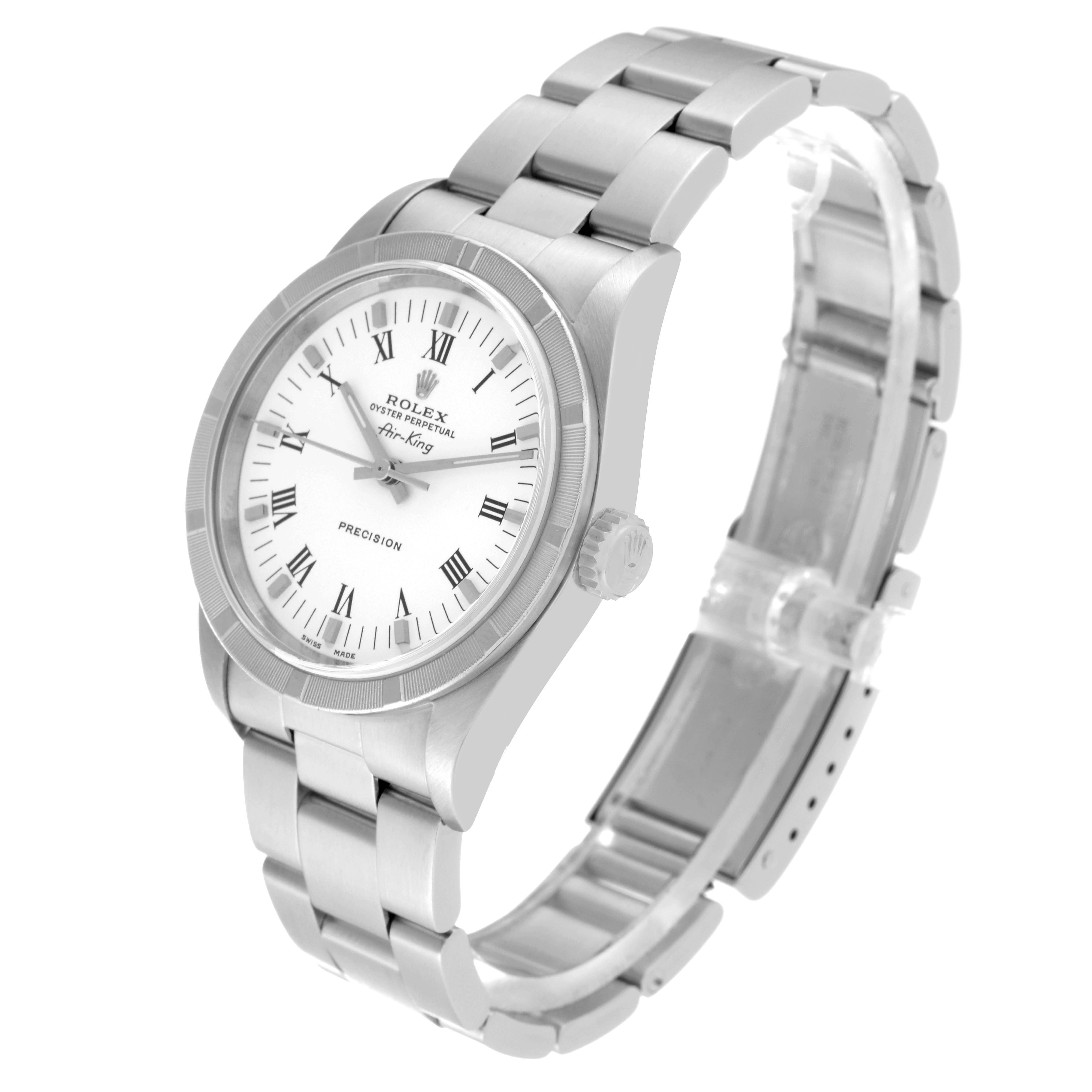 The Rolex Air-King 14010M Men's Stainless Steel White Dial 14010M Men's Stainless Steel White Dial watch is shown at a three-quarter angle, highlighting its face, bezel, bracelet, and crown.