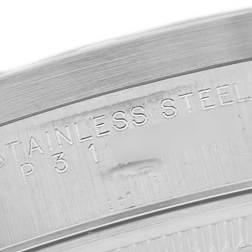 The image shows a close-up of the engraving on the stainless steel case back of a Rolex Air-King 14010 Men's Stainless Steel Silver Dial 14010 Men's Stainless Steel Silver Dial watch.