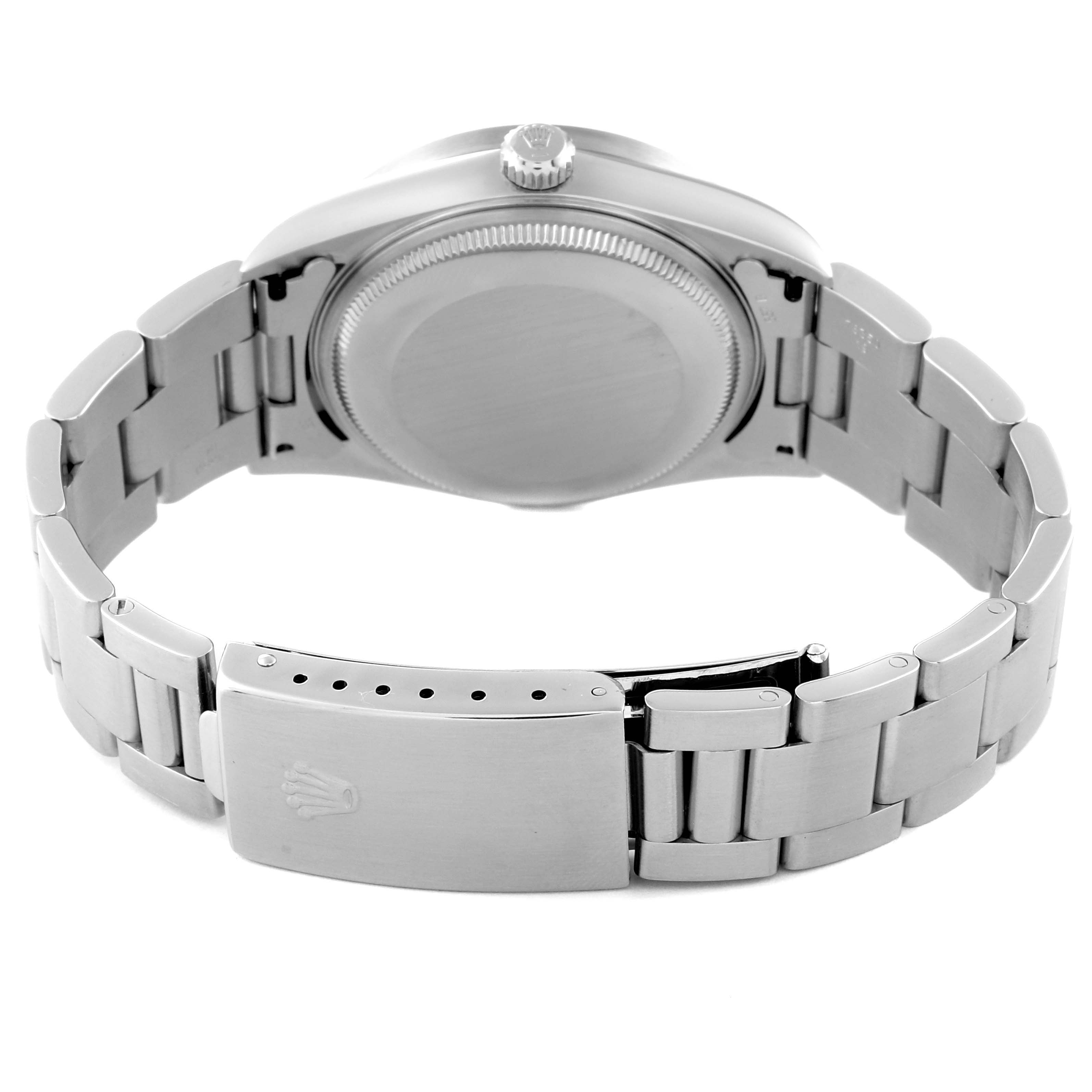 The image shows the back view of the Rolex Air-King 14010 Men's Stainless Steel Silver Dial 14010 Men's Stainless Steel Silver Dial watch, highlighting the caseback, crown, and metal bracelet with a clasp.