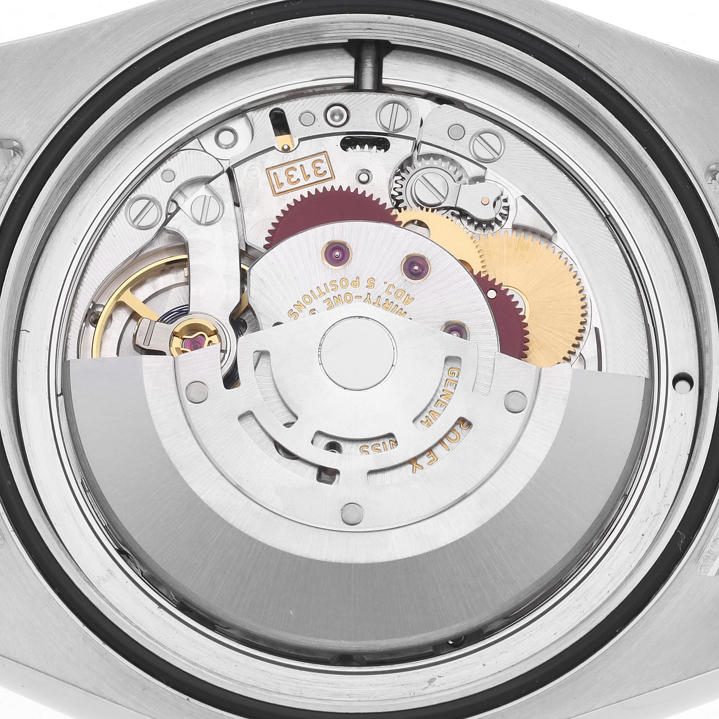 The image shows the internal mechanism of a Rolex Air-King 116900 Men's Stainless Steel Black Dial 116900 Men's Stainless Steel Black Dial watch, viewed from the back, highlighting gears and components.