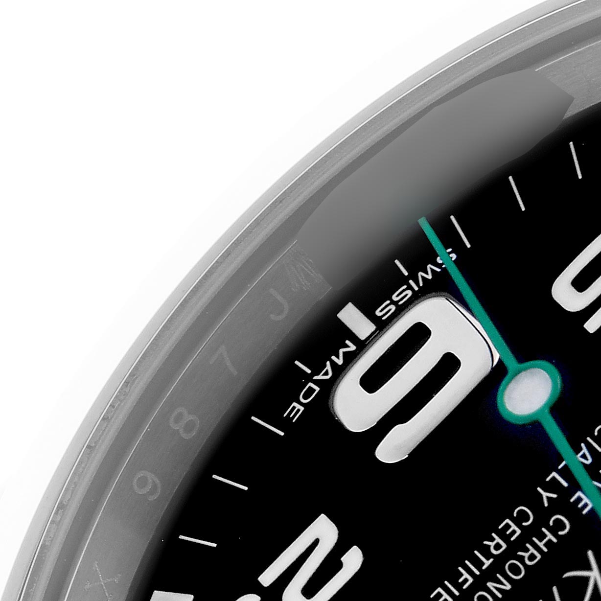 The image shows a close-up of the dial edge and part of the bezel of the Rolex Air-King 116900 Men's Stainless Steel Black Dial 116900 Men's Stainless Steel Black Dial.