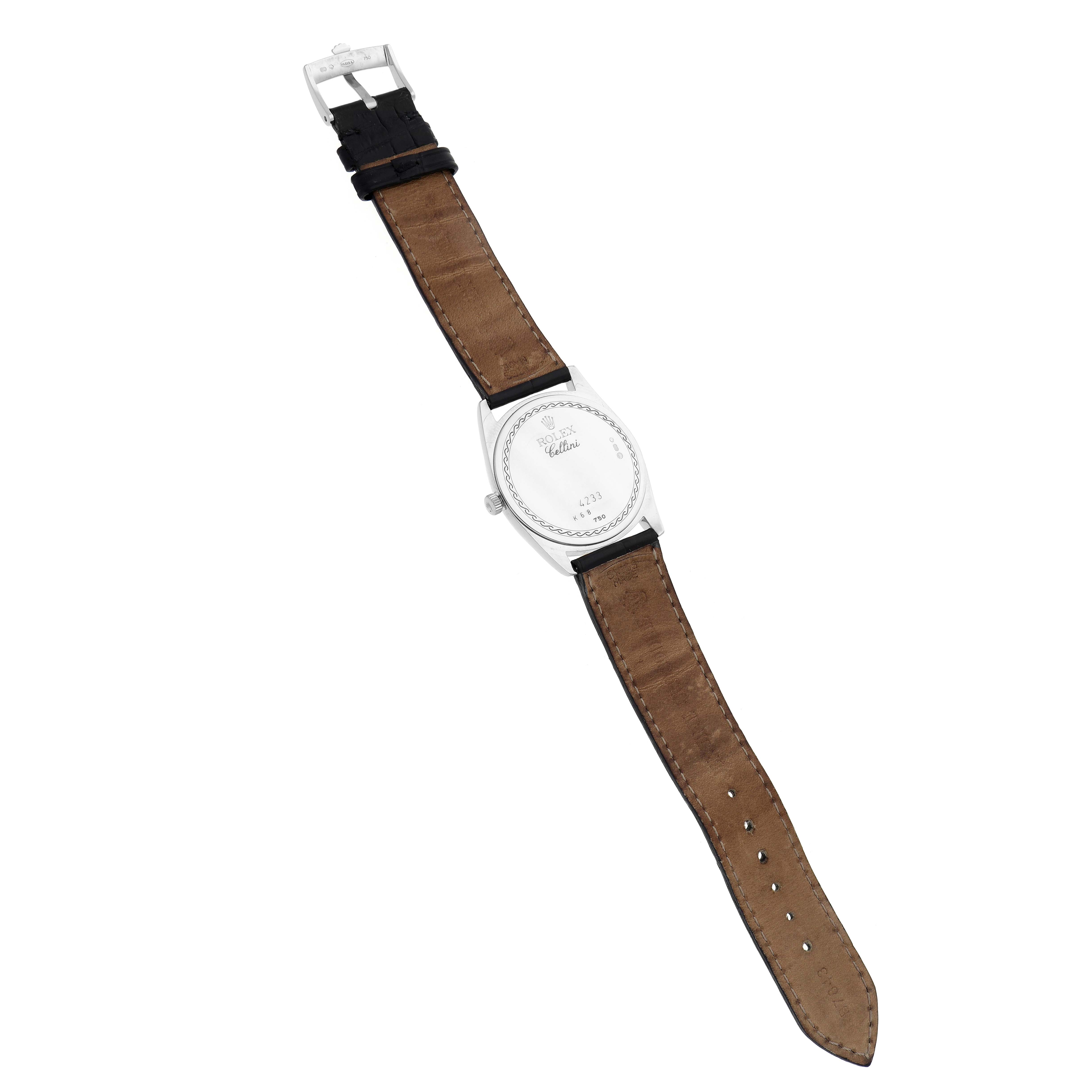 The image shows the back of a Rolex Cellini 4233 Men
s White Gold Black Dial 4233 Men
s White Gold Black Dial watch at a three-quarter top angle, revealing the case back and leather strap.