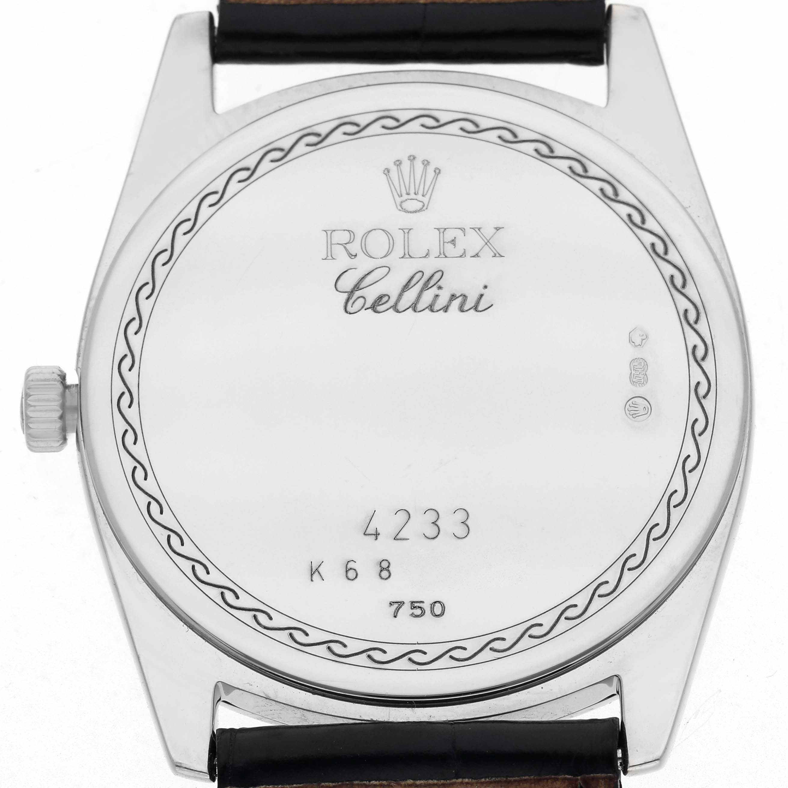 The image shows the back case of the Rolex Cellini 4233 Men
s White Gold Black Dial 4233 Men
s White Gold Black Dial watch, including engravings and strap attachments.
