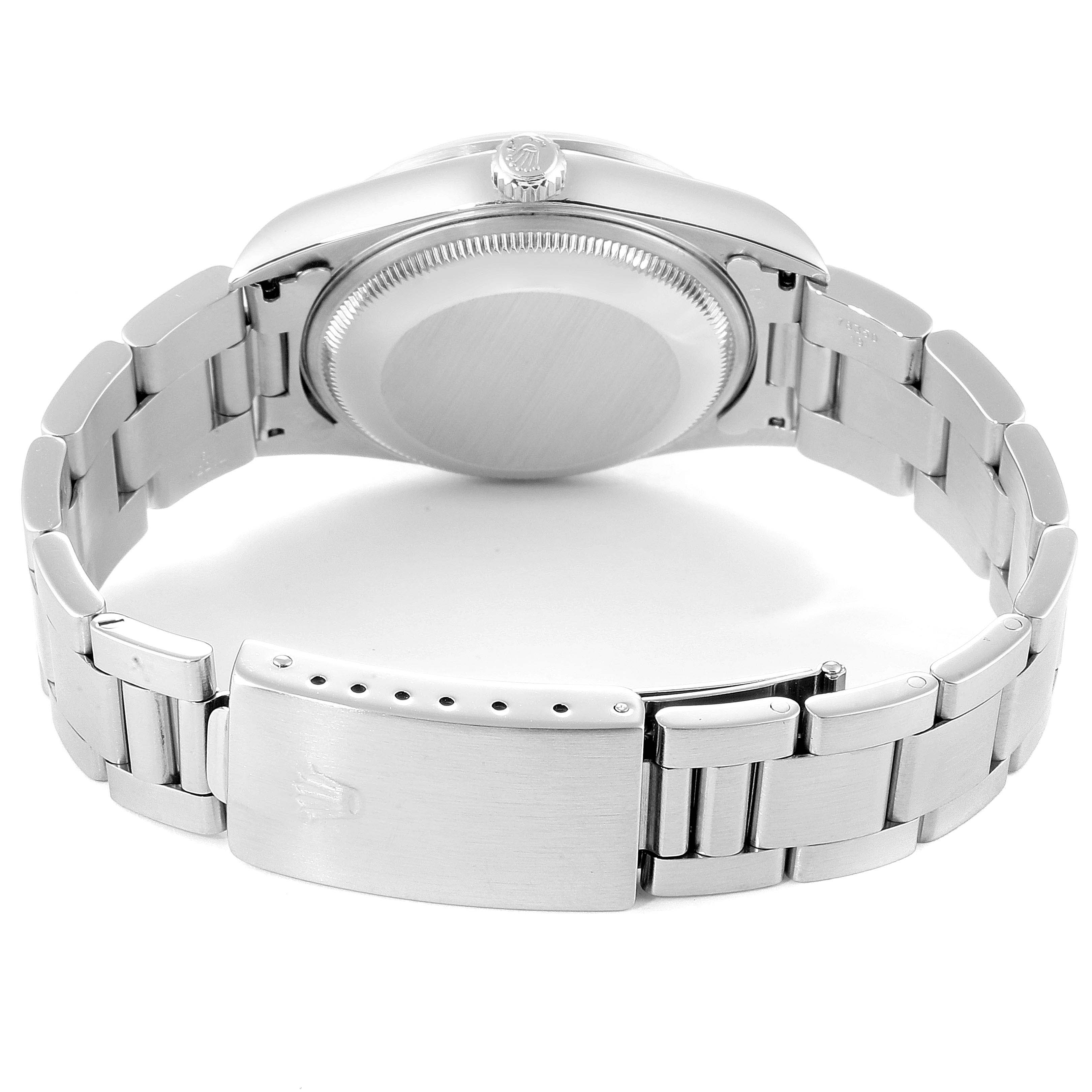 The image shows the back case, crown, and clasp of a Rolex Date 15200 Men's Stainless Steel Black Dial 15200 Men's Stainless Steel Black Dial model watch from a rear angle.