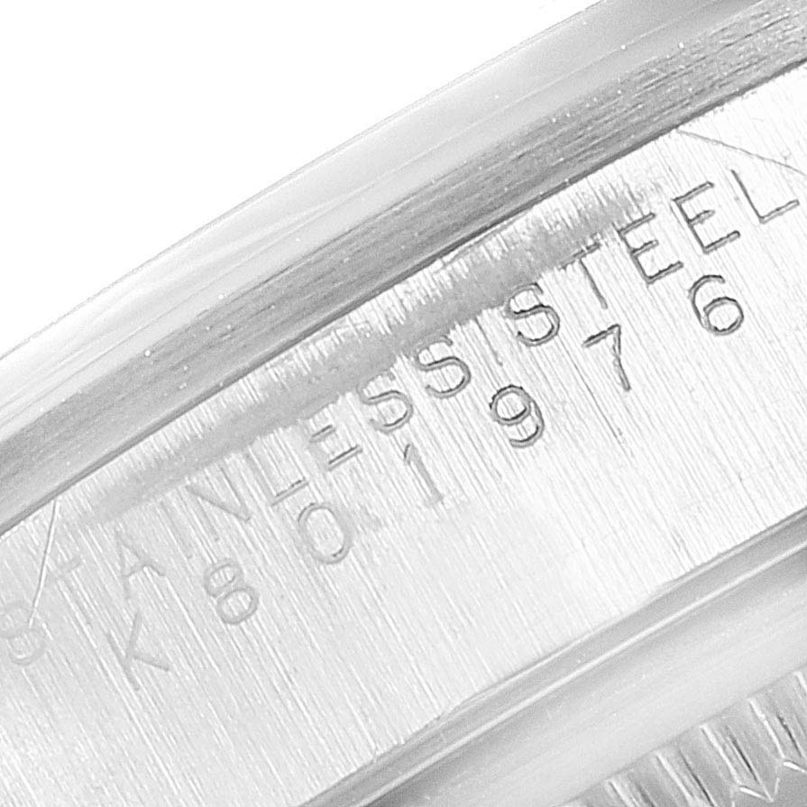 The image shows a close-up of the stainless steel backing and serial numbers of a Rolex Date 15200 Men's Stainless Steel Black Dial 15200 Men's Stainless Steel Black Dial model watch.