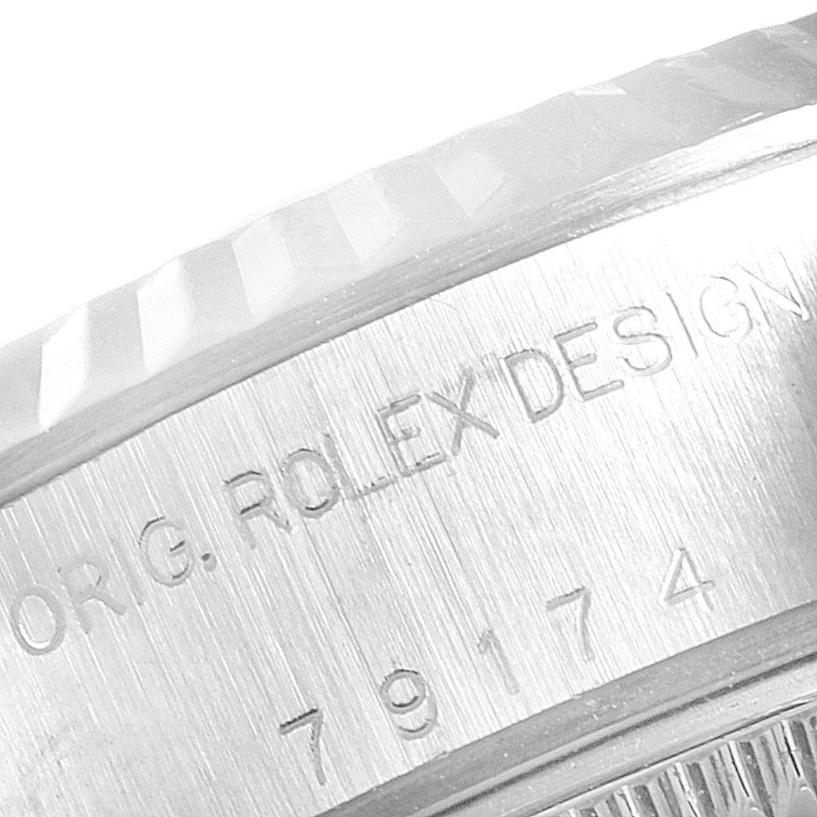 The image shows a close-up of the case side with the "ROLEX DESIGN" engraving and reference number on a Rolex Datejust 79174 Women's Stainless Steel Silver Dial 79174 Women's Stainless Steel Silver Dial watch.