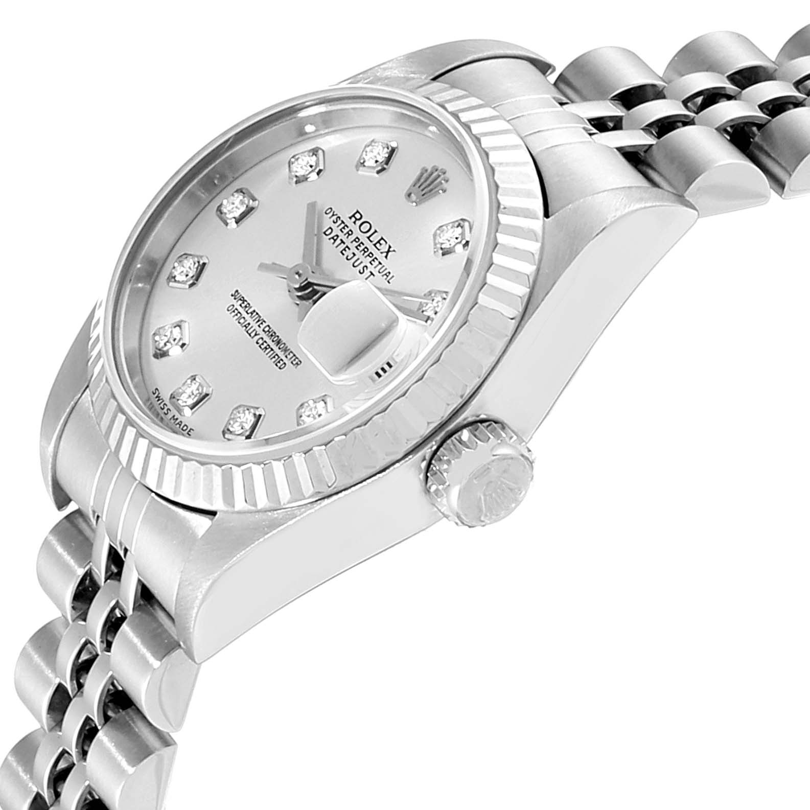 The image shows a close-up angled view of the Rolex Datejust 79174 Women's Stainless Steel Silver Dial 79174 Women's Stainless Steel Silver Dial's dial, crown, and part of its bracelet.