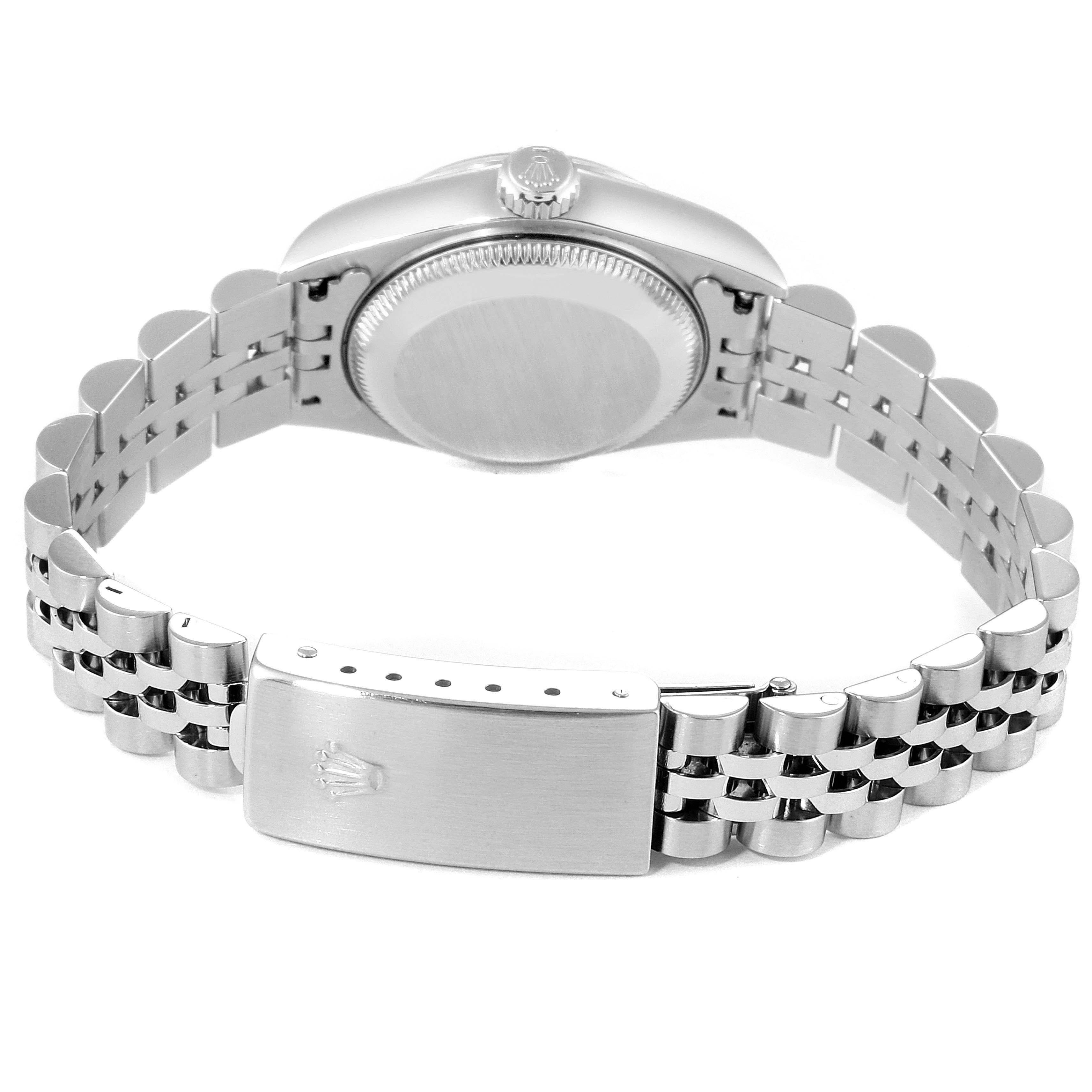 This image shows the back view of a Rolex Datejust 79174 Women's Stainless Steel Silver Dial 79174 Women's Stainless Steel Silver Dial watch, highlighting the case back, crown, and the Jubilee bracelet with a clasp.