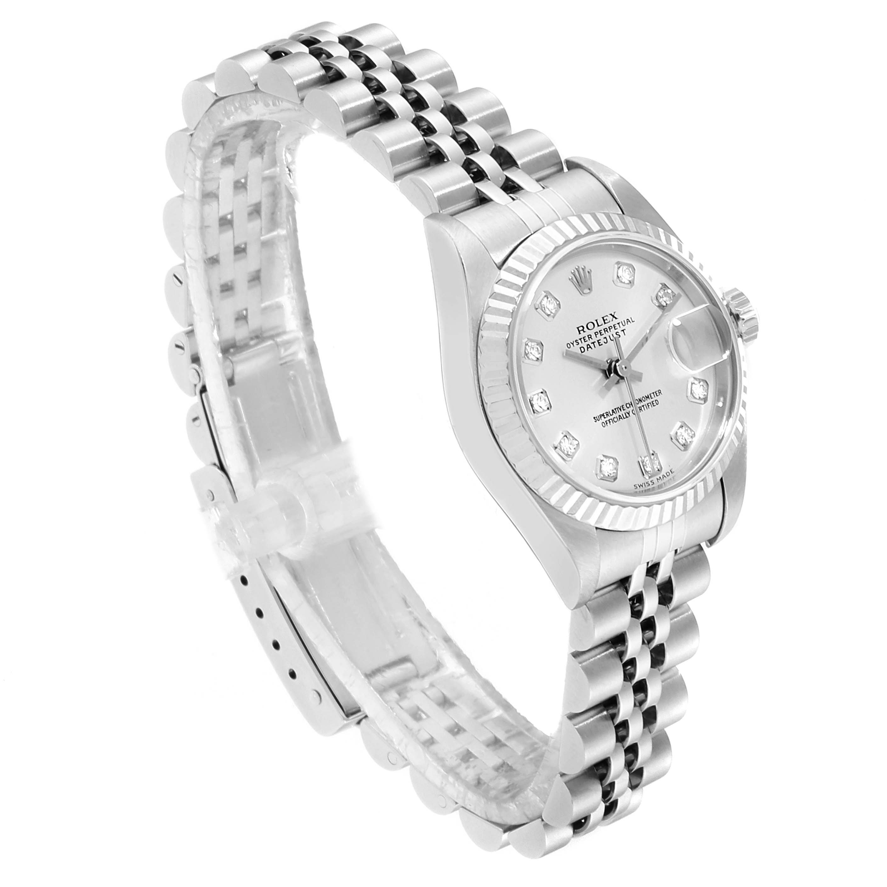 The image shows a Rolex Datejust 79174 Women's Stainless Steel Silver Dial 79174 Women's Stainless Steel Silver Dial watch from an angled view, displaying the face, fluted bezel, and Jubilee bracelet.