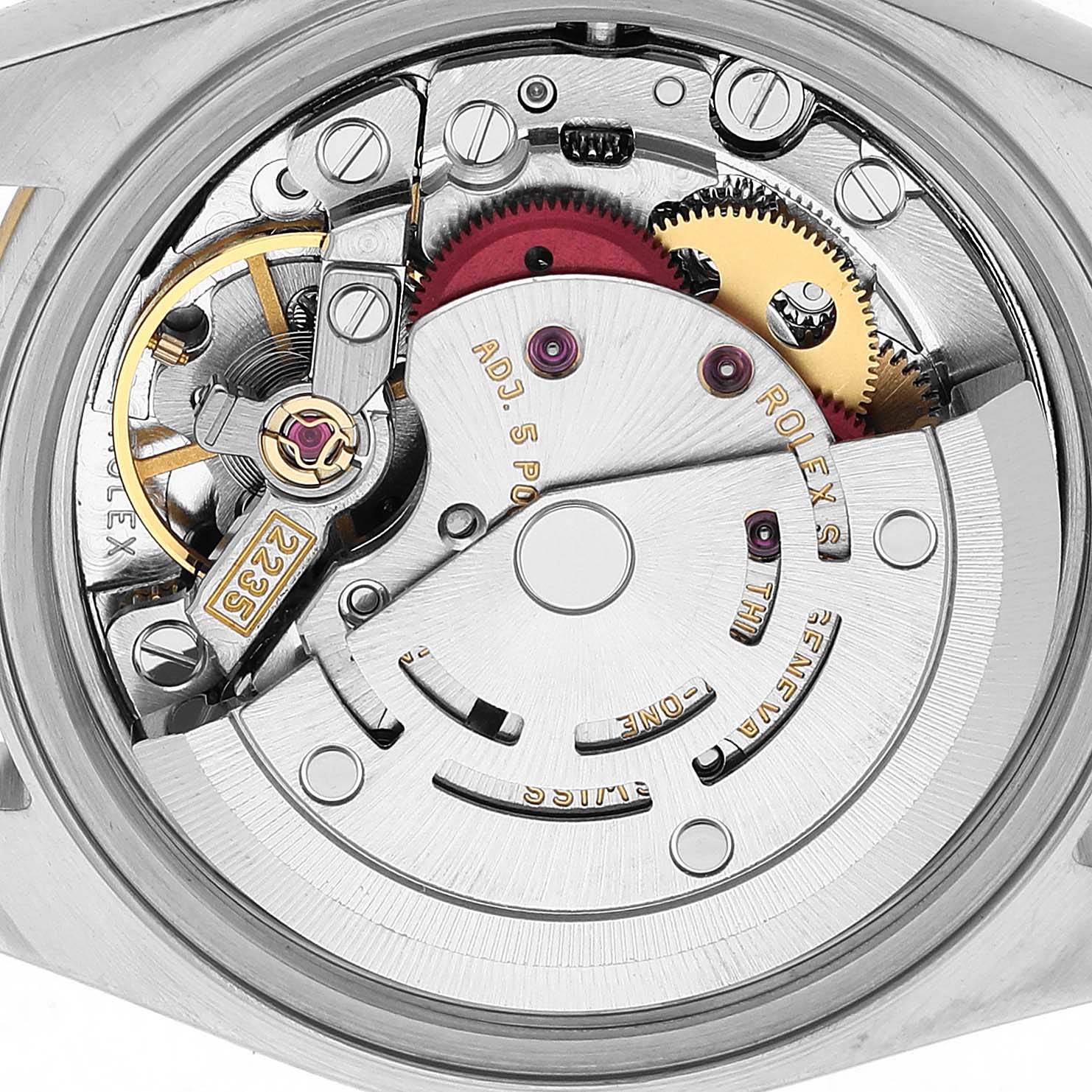 The image shows the movement of the Rolex Datejust 79173 Women's Stainless Steel White Dial watch from a top-down angle, highlighting gears and mechanical components.