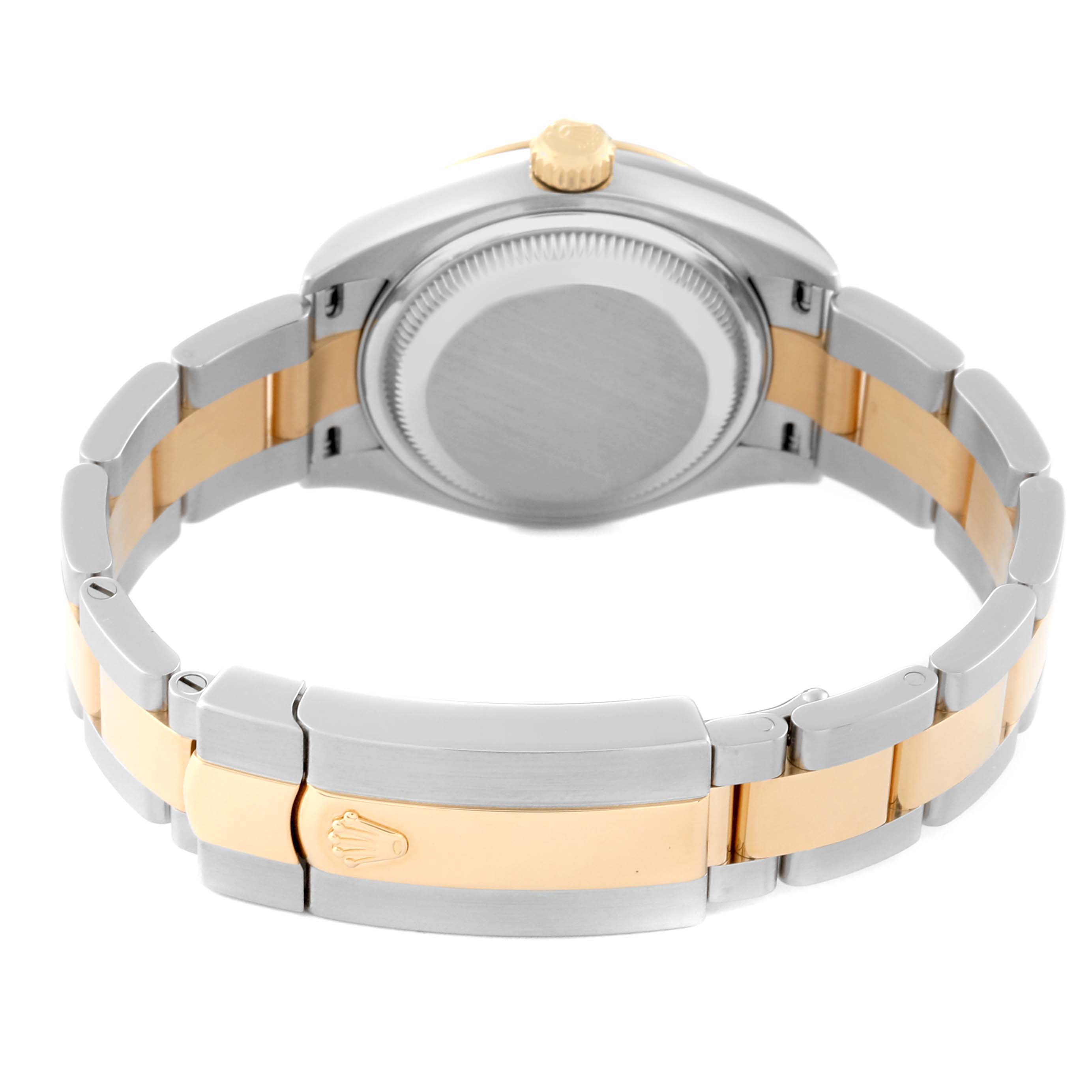 The image depicts the back of a Rolex Datejust 279173 Women's Steel and Gold (two tone) Silver Dial 279173 Women's Steel and Gold (two tone) Silver Dial watch, showing its case, crown, and two-tone bracelet clasp.