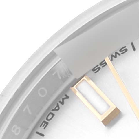 This is a close-up image of the Rolex Datejust 279173 Women's Steel and Gold (two tone) Silver Dial 279173 Women's Steel and Gold (two tone) Silver Dial watch, showing part of the dial, "SWISS" text, and a gold hour marker.