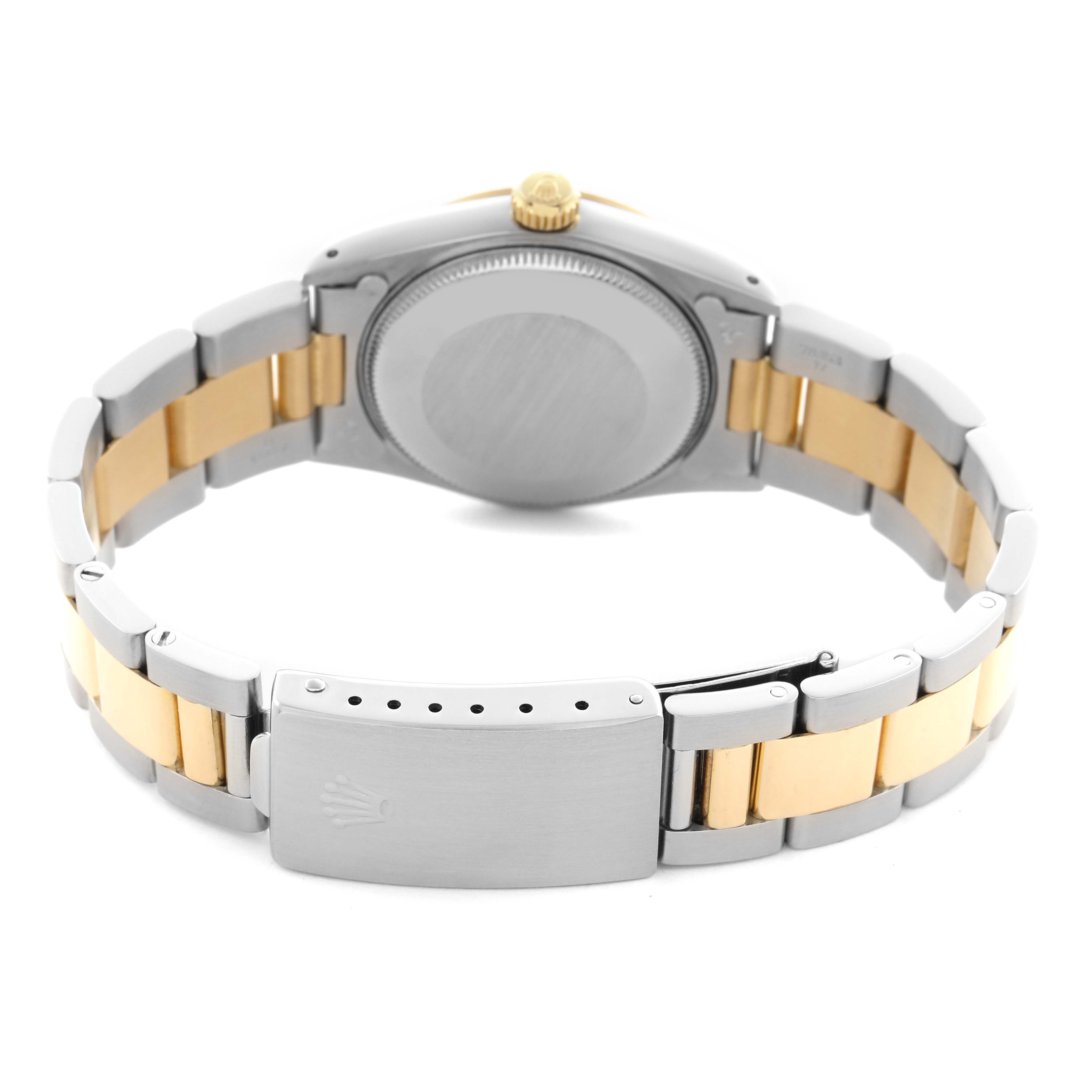 The image shows the back of a Rolex Mid-Size 68273 Women
s Steel and Gold (two tone) Champagne Dial 68273 Women
s Steel and Gold (two tone) Champagne Dial model, highlighting the bracelet, clasp, and case back.