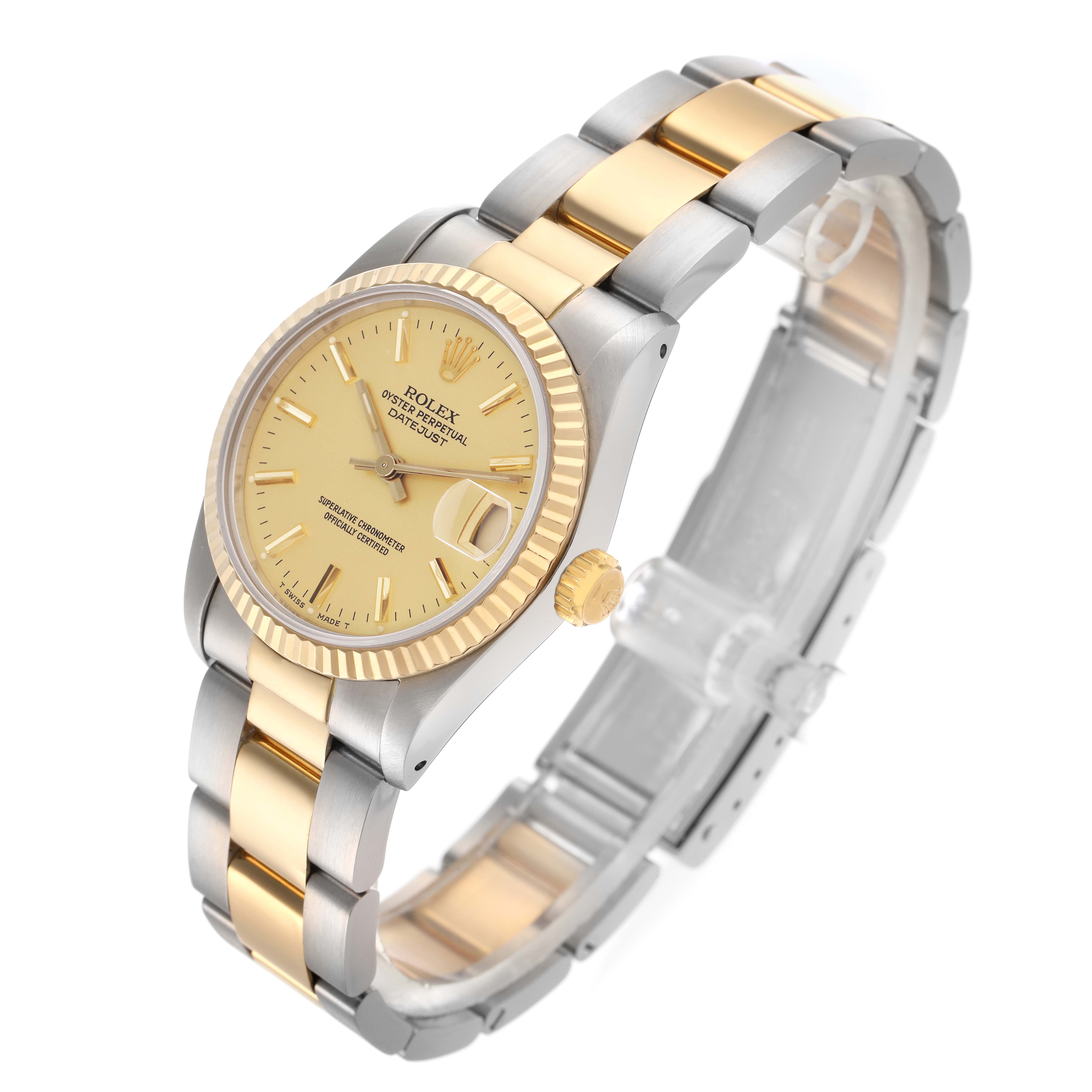 The Rolex Mid-Size 68273 Women
s Steel and Gold (two tone) Champagne Dial 68273 Women
s Steel and Gold (two tone) Champagne Dial watch is shown from an angled top view, highlighting the dial, bezel, and two-tone bracelet.