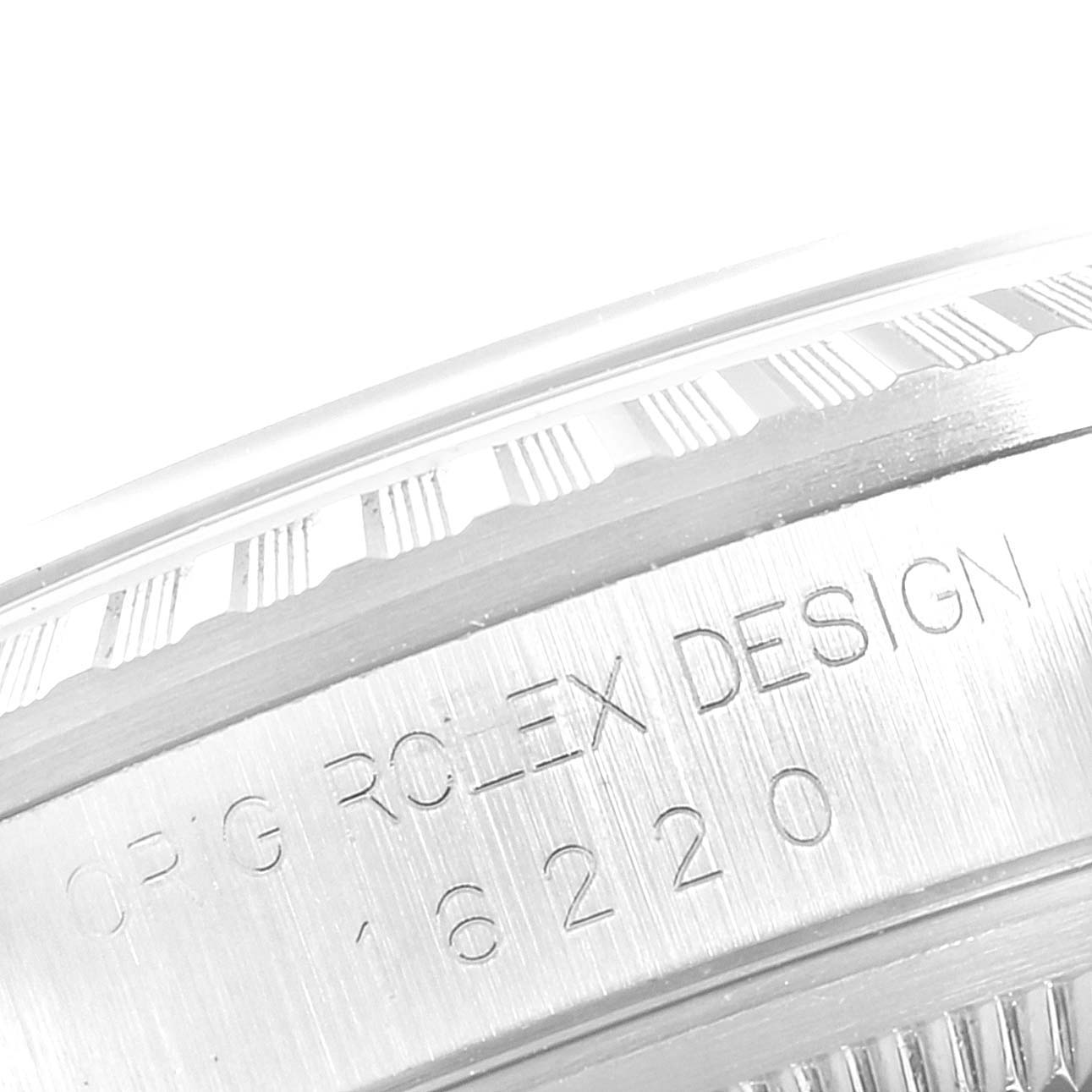 This image shows a close-up of the side-engraving displaying "Rolex Design 16220" on a Rolex Datejust 16220 Men's Stainless Steel White Dial 16220 Men's Stainless Steel White Dial watch.