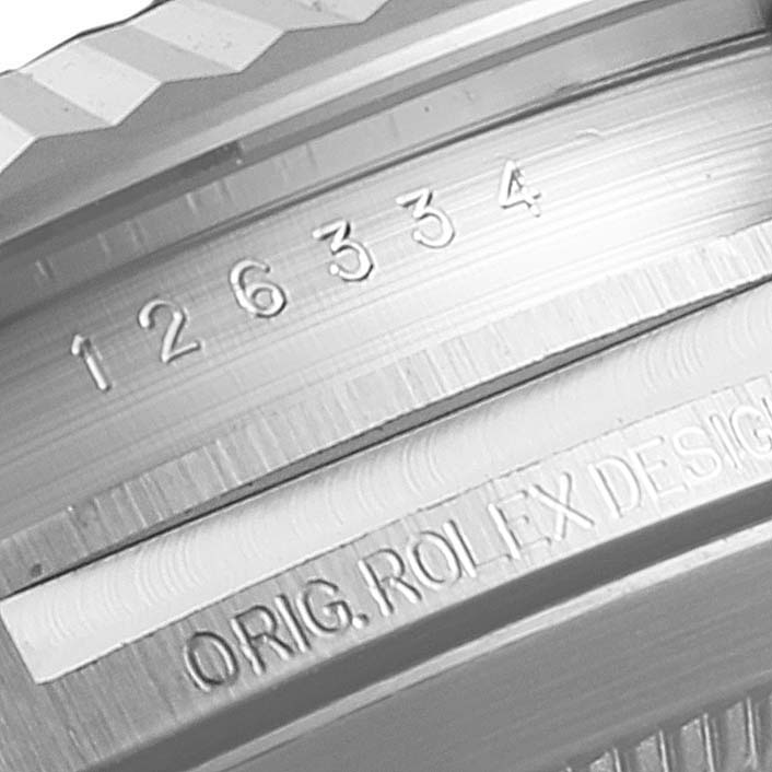 This image shows a close-up of the case side and serial number of the Rolex Datejust 41 126334 Men's Stainless Steel Grey Dial 126334 Men's Stainless Steel Grey Dial model.