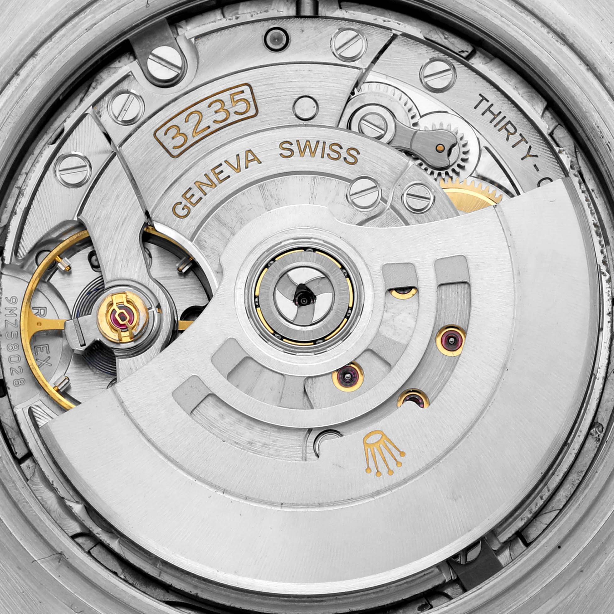 The image shows the inner mechanical movement of the Rolex Datejust 41 M126333-0012 Men's Steel and Gold (two tone) Black Dial M126333-0012 Men's Steel and Gold (two tone) Black Dial, featuring the Geneva Swiss 3235 caliber.