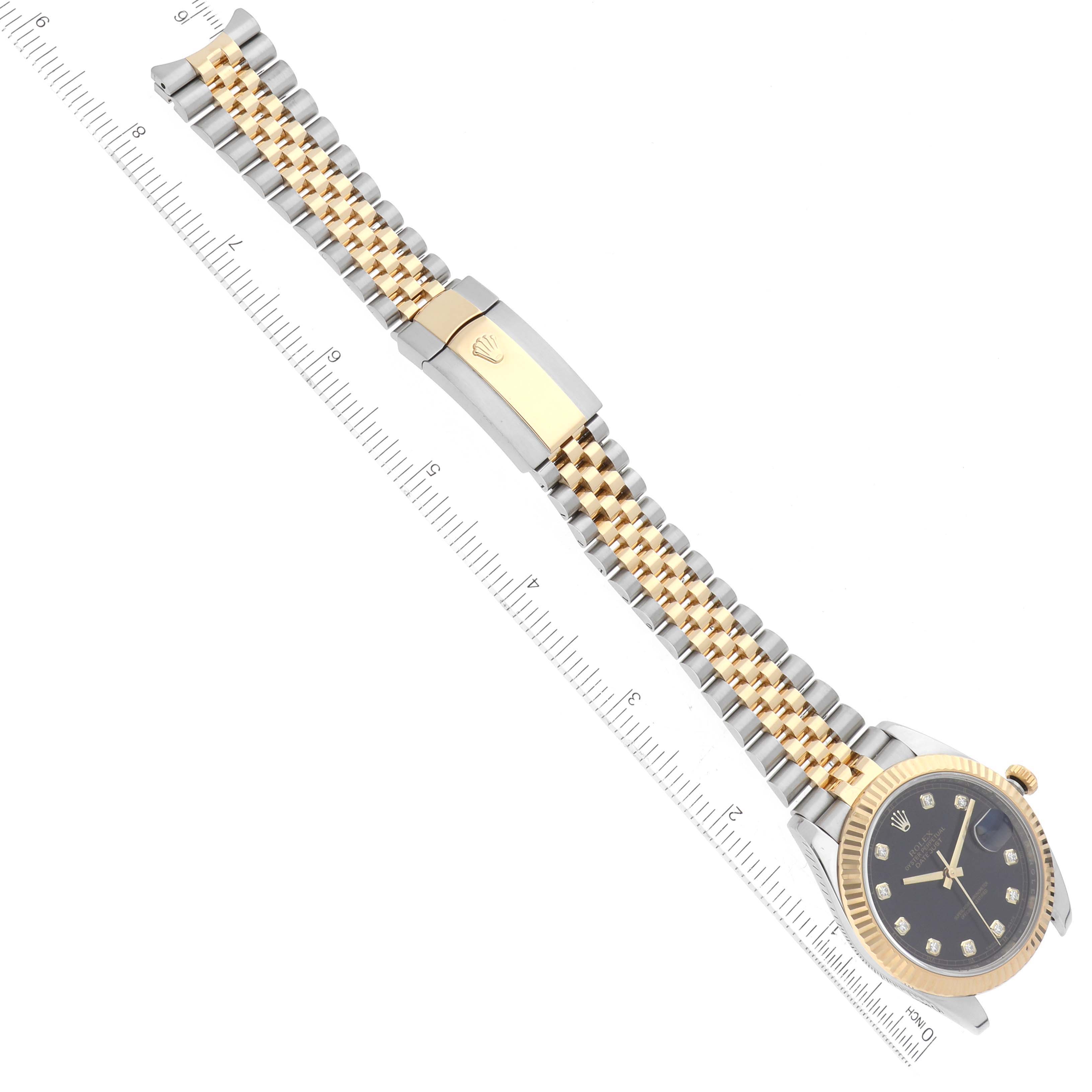 The Rolex Datejust 41 M126333-0012 Men's Steel and Gold (two tone) Black Dial M126333-0012 Men's Steel and Gold (two tone) Black Dial watch is shown diagonally from an angle, displaying the face, bezel, and partially extended two-tone bracelet.