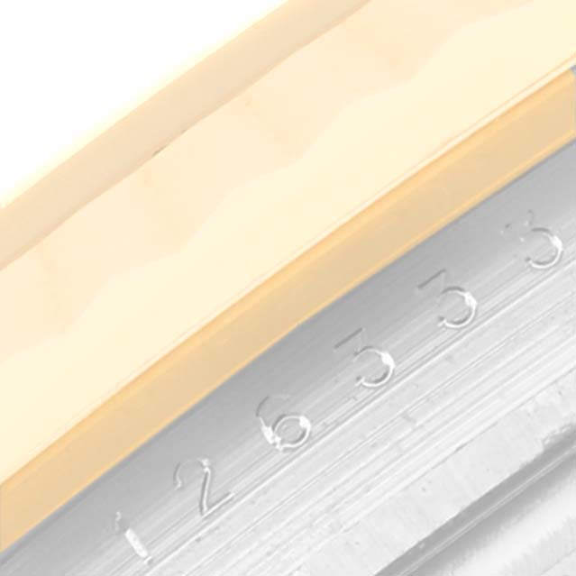 This image shows a close-up of the bezel and part of the dial markings of the Rolex Datejust 41 M126333-0012 Men's Steel and Gold (two tone) Black Dial M126333-0012 Men's Steel and Gold (two tone) Black Dial watch.