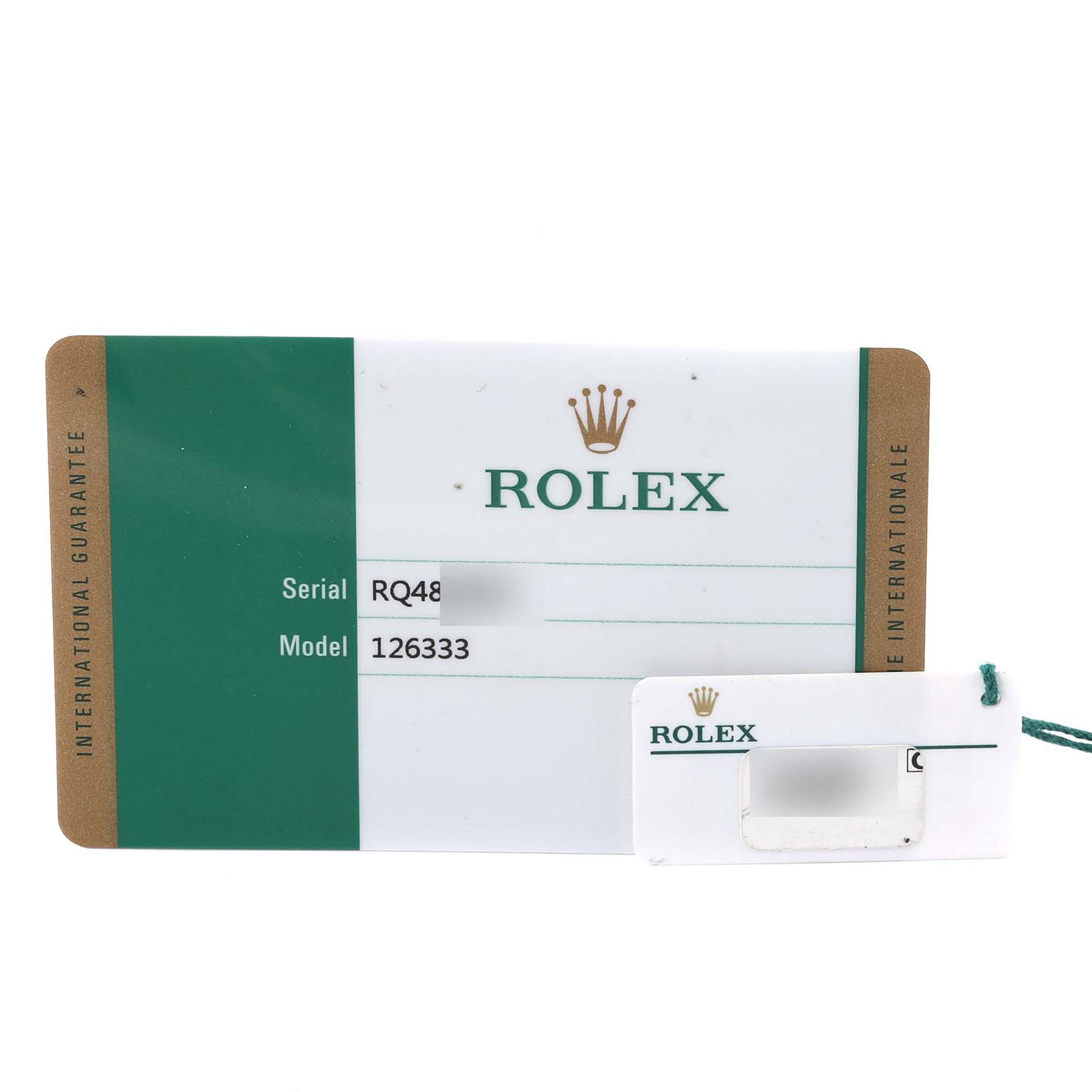 The image shows the warranty card and hang tag for a Rolex Datejust 41 M126333-0012 Men's Steel and Gold (two tone) Black Dial M126333-0012 Men's Steel and Gold (two tone) Black Dial model 126333.