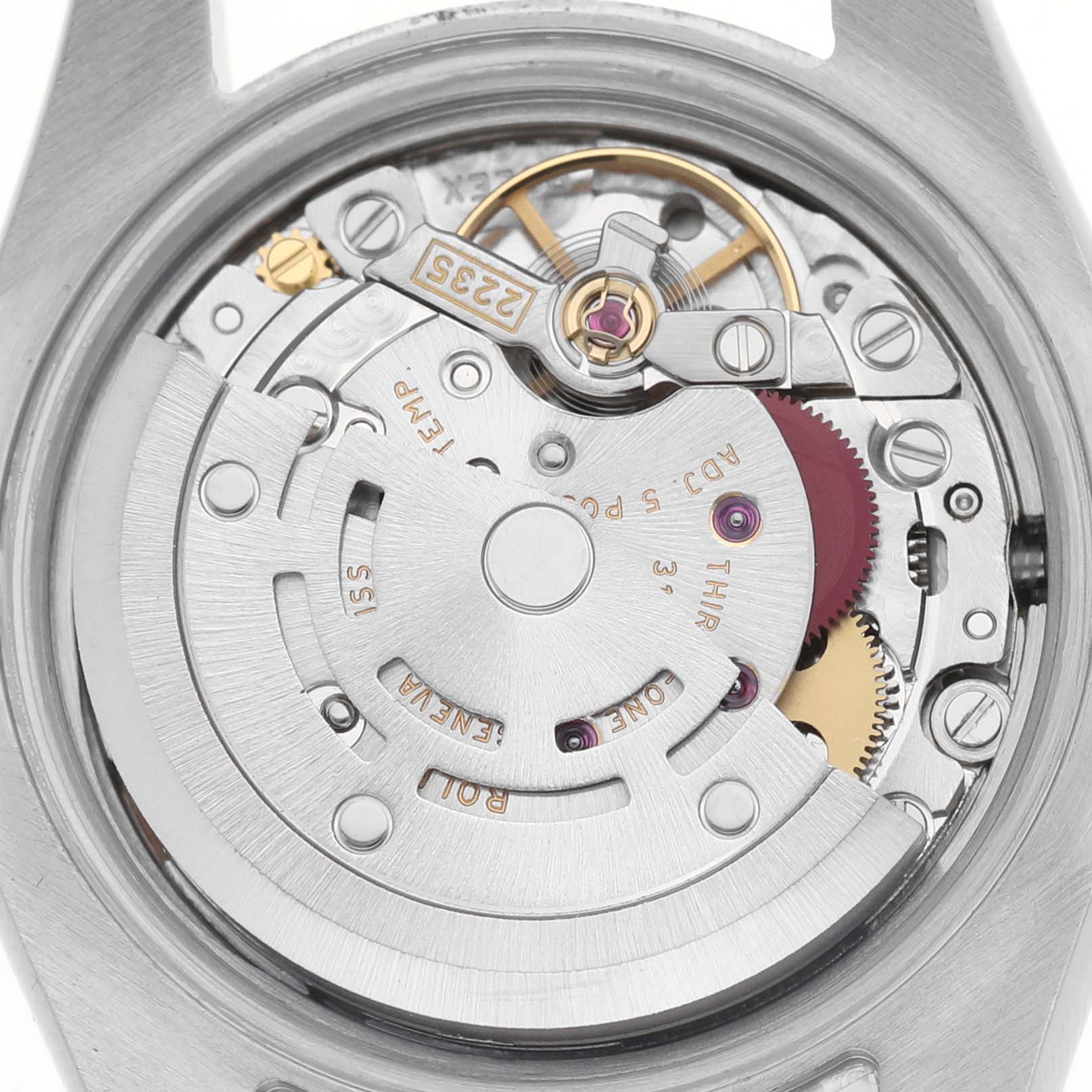 The image shows the movement of a Rolex Datejust 179173 Women's Steel and Gold (two tone) Champagne Dial 179173 Women's Steel and Gold (two tone) Champagne Dial, with its rotor, gears, and other intricate components visible from the back.