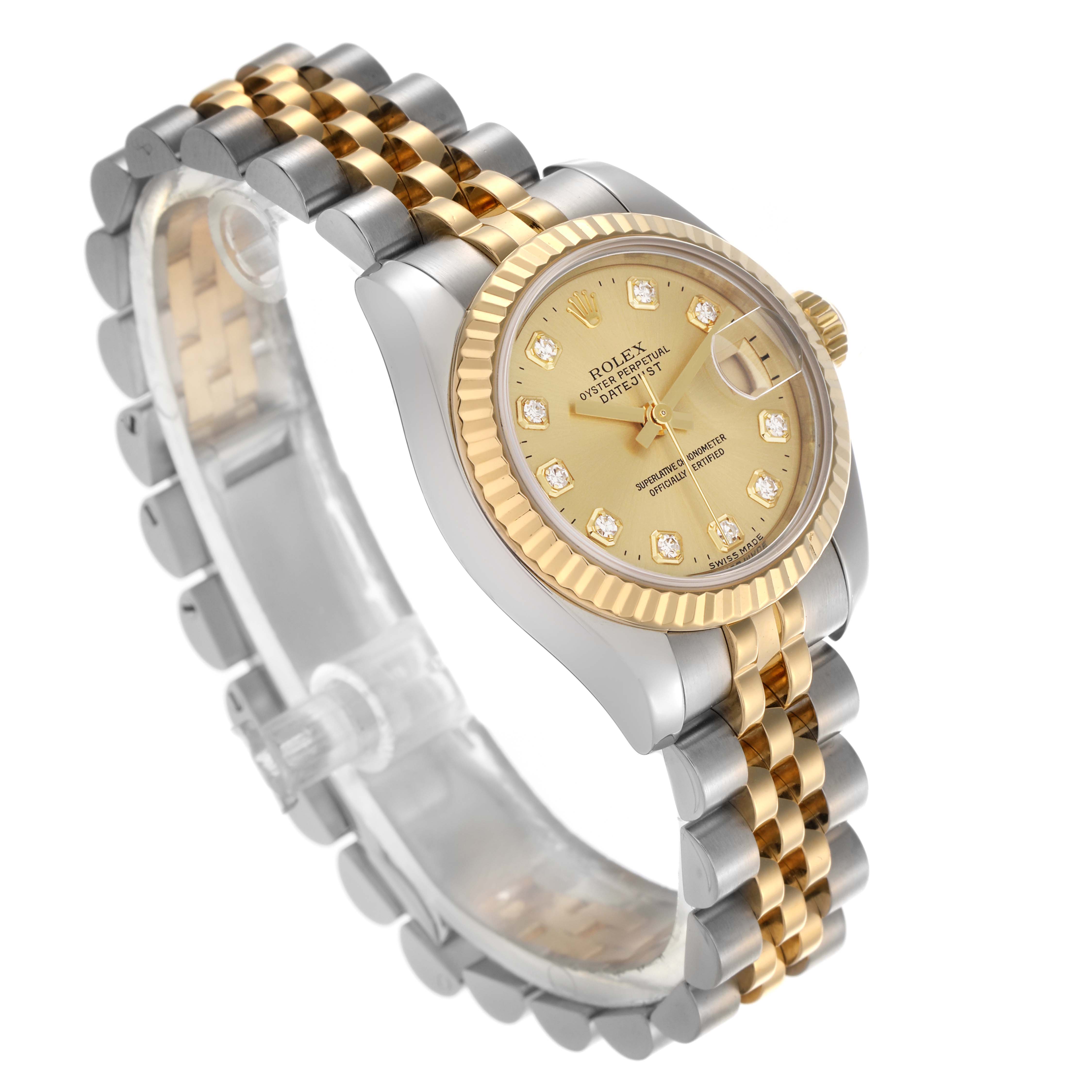 The Rolex Datejust 179173 Women's Steel and Gold (two tone) Champagne Dial 179173 Women's Steel and Gold (two tone) Champagne Dial watch is shown at a three-quarter angle, displaying its gold dial, bezel, and two-tone bracelet.