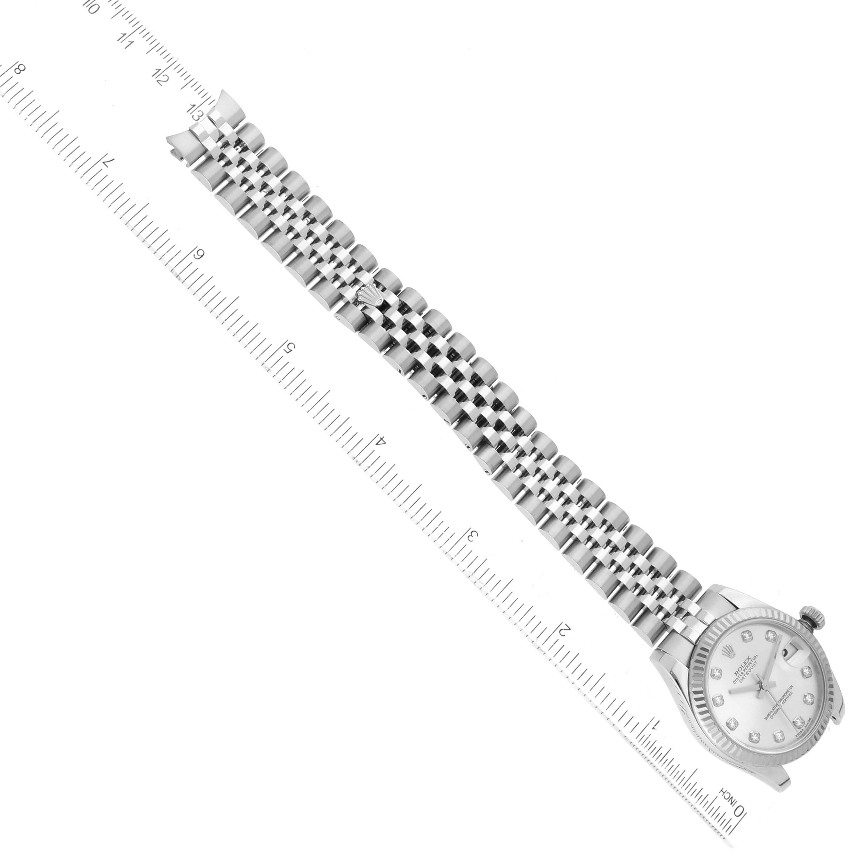 This image shows the Rolex Mid-Size 178274 Women
s Stainless Steel Silver Dial 178274 Women
s Stainless Steel Silver Dial model watch from an overhead angle, highlighting the face and full length of the bracelet.