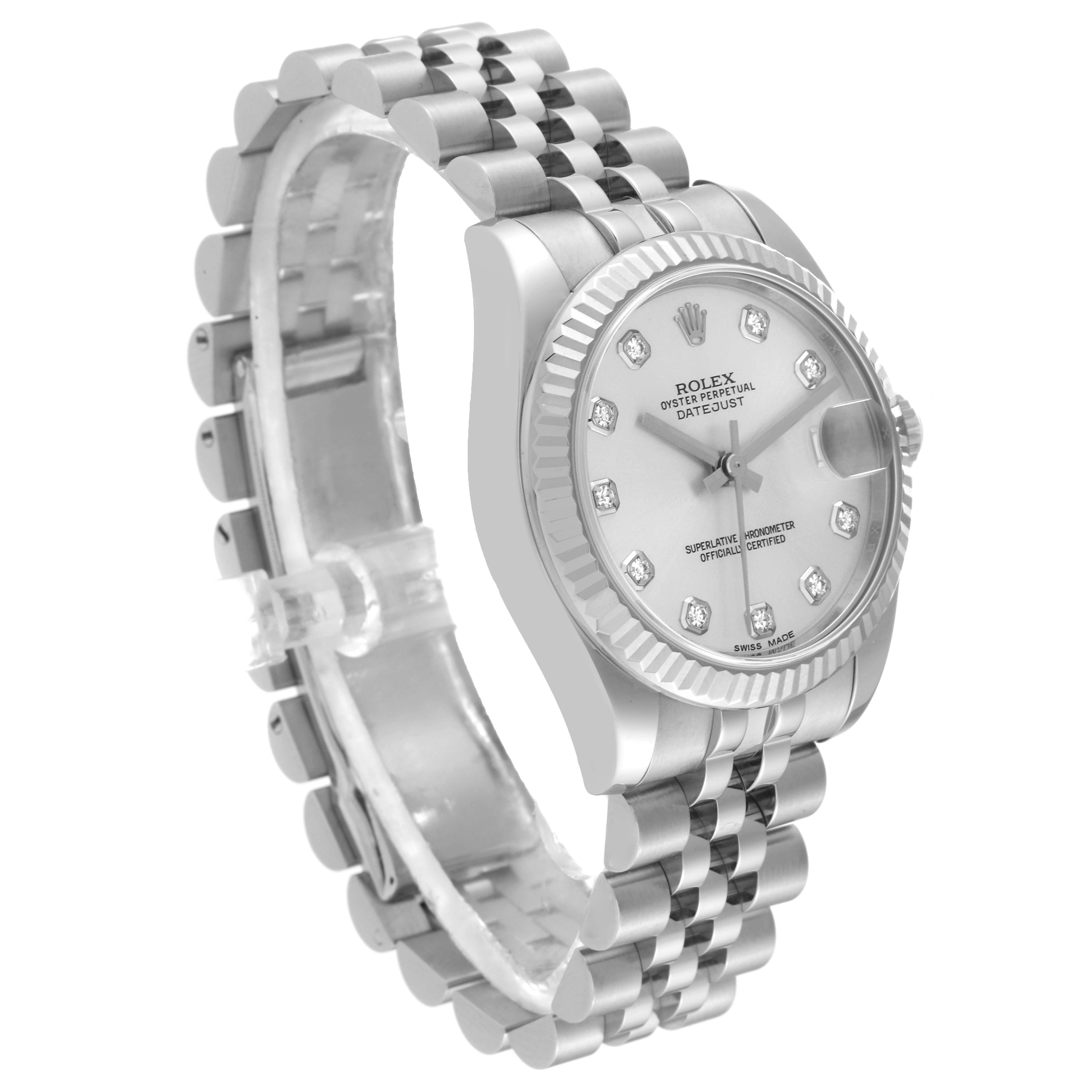 The Mid-Size Rolex watch is shown at a slight angle, highlighting the dial, bezel, and bracelet.