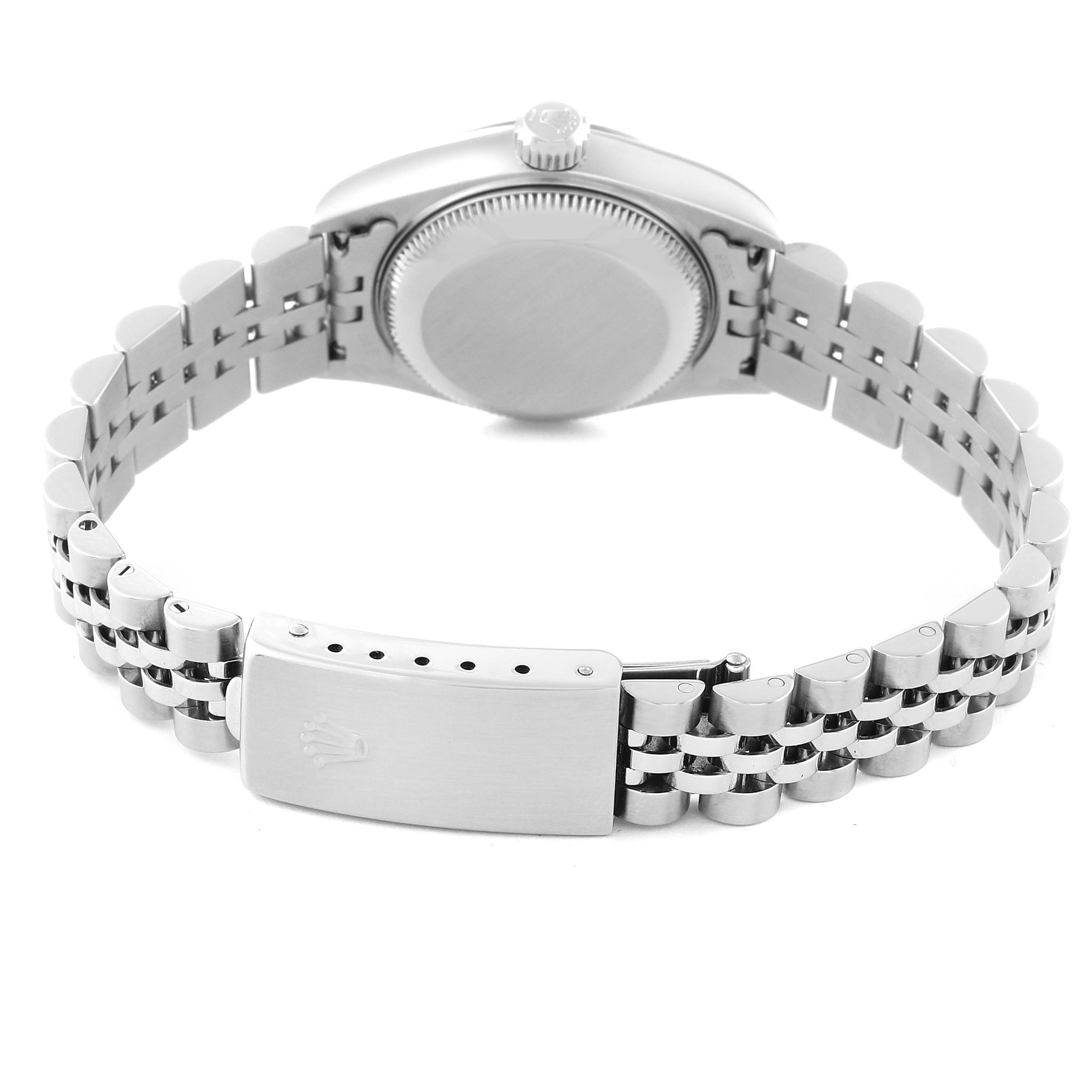 The image shows the back of a Rolex Datejust 79174 Women's Stainless Steel Mother of Pearl Dial 79174 Women's Stainless Steel Mother of Pearl Dial watch, highlighting the case back, crown, and Jubilee bracelet with the clasp.