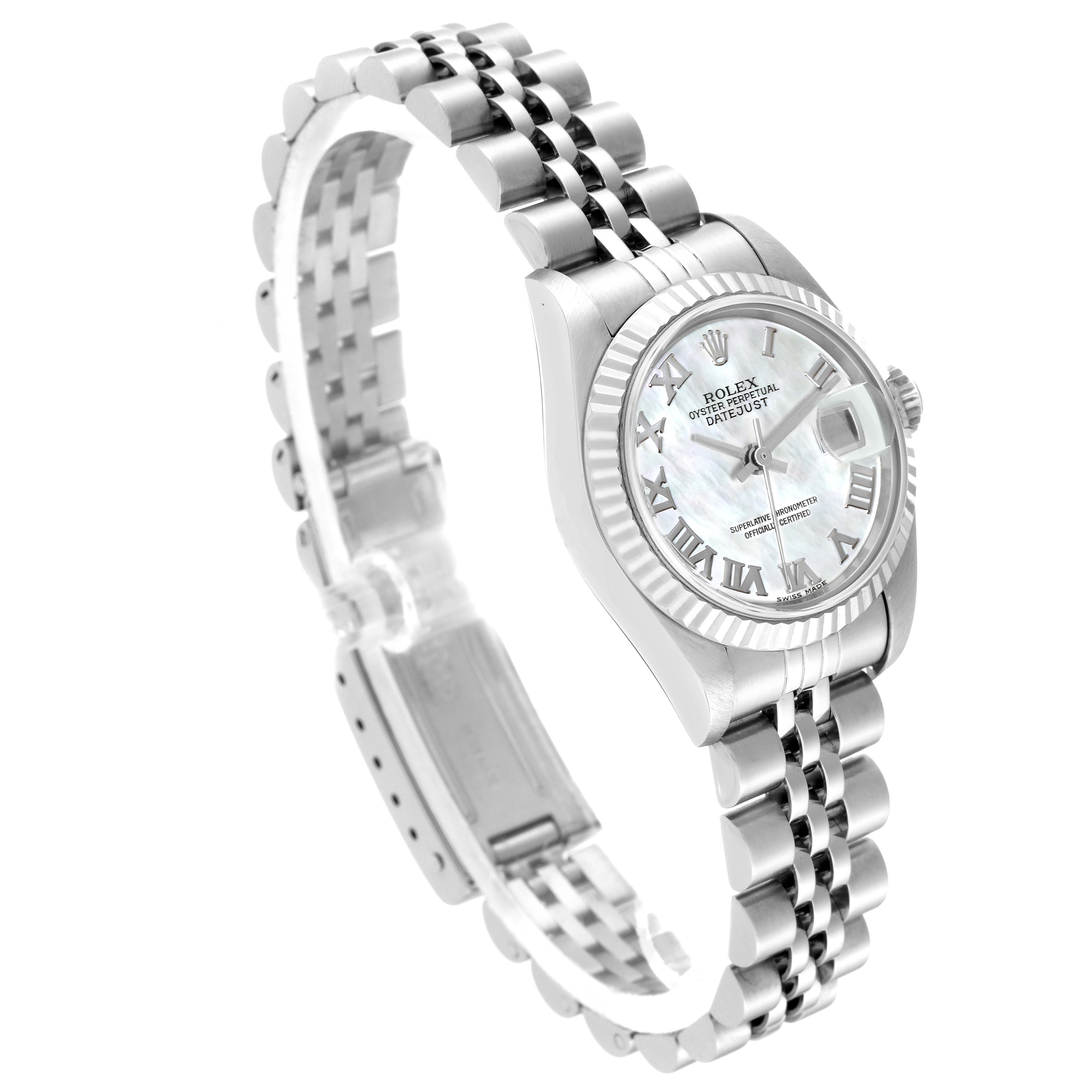 The Rolex Datejust 79174 Women's Stainless Steel Mother of Pearl Dial 79174 Women's Stainless Steel Mother of Pearl Dial watch is shown at a tilted angle, displaying its face, bracelet, and clasp.