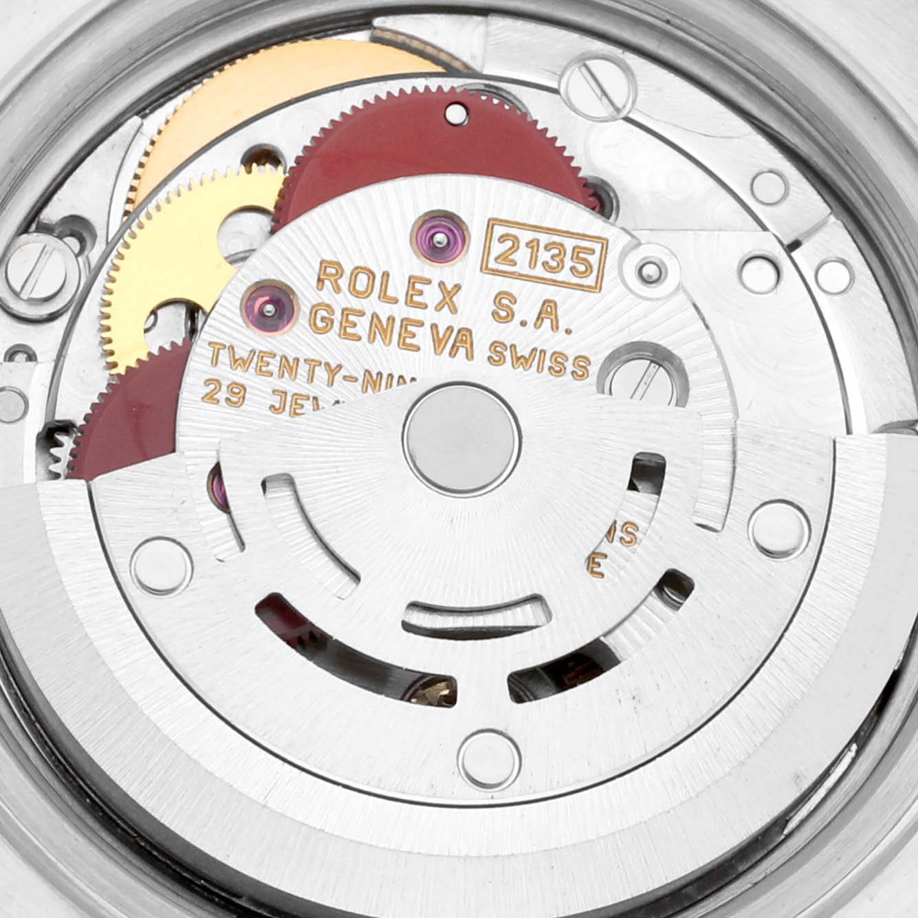 Close-up view of the movement mechanism in a Rolex Datejust 69173 Women's Steel and Gold (two tone) White Dial 69173 Women's Steel and Gold (two tone) White Dial watch, showing gears and the rotor.