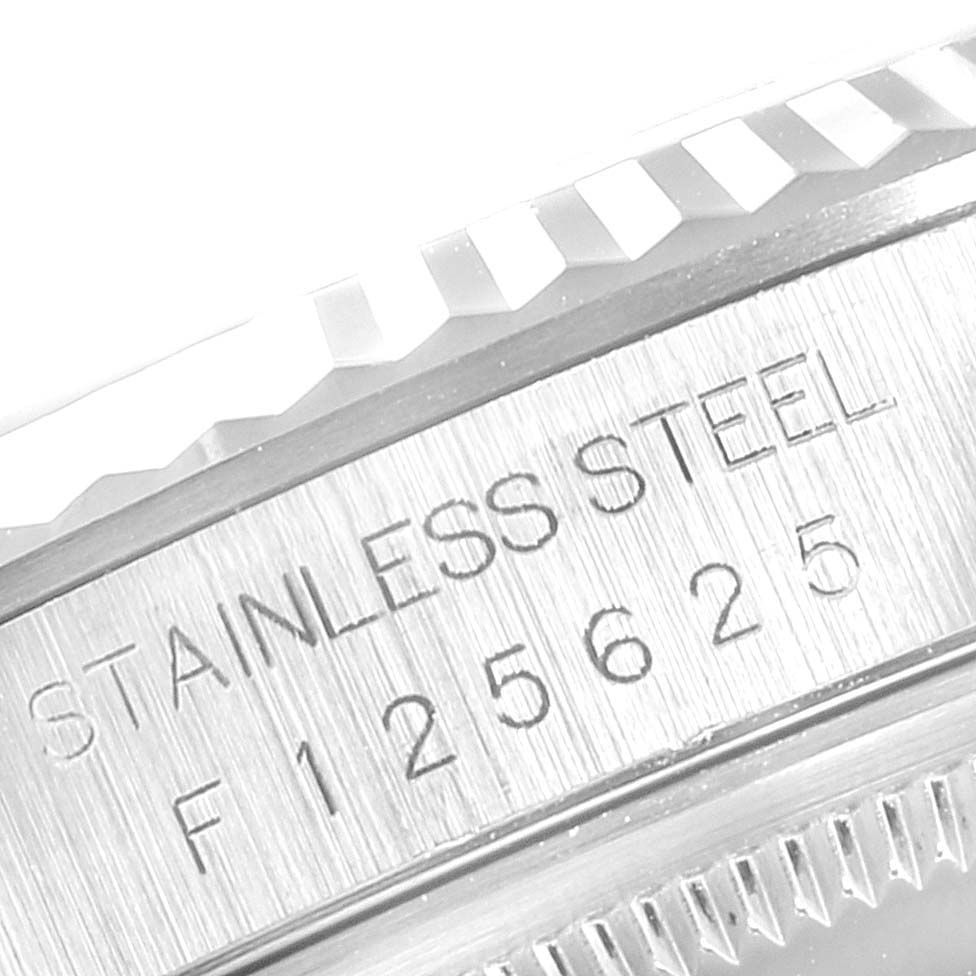 This close-up image shows the stainless steel bezel and part of the case of the Rolex Datejust 16234 Men's Stainless Steel Silver Dial 16234 Men's Stainless Steel Silver Dial watch.