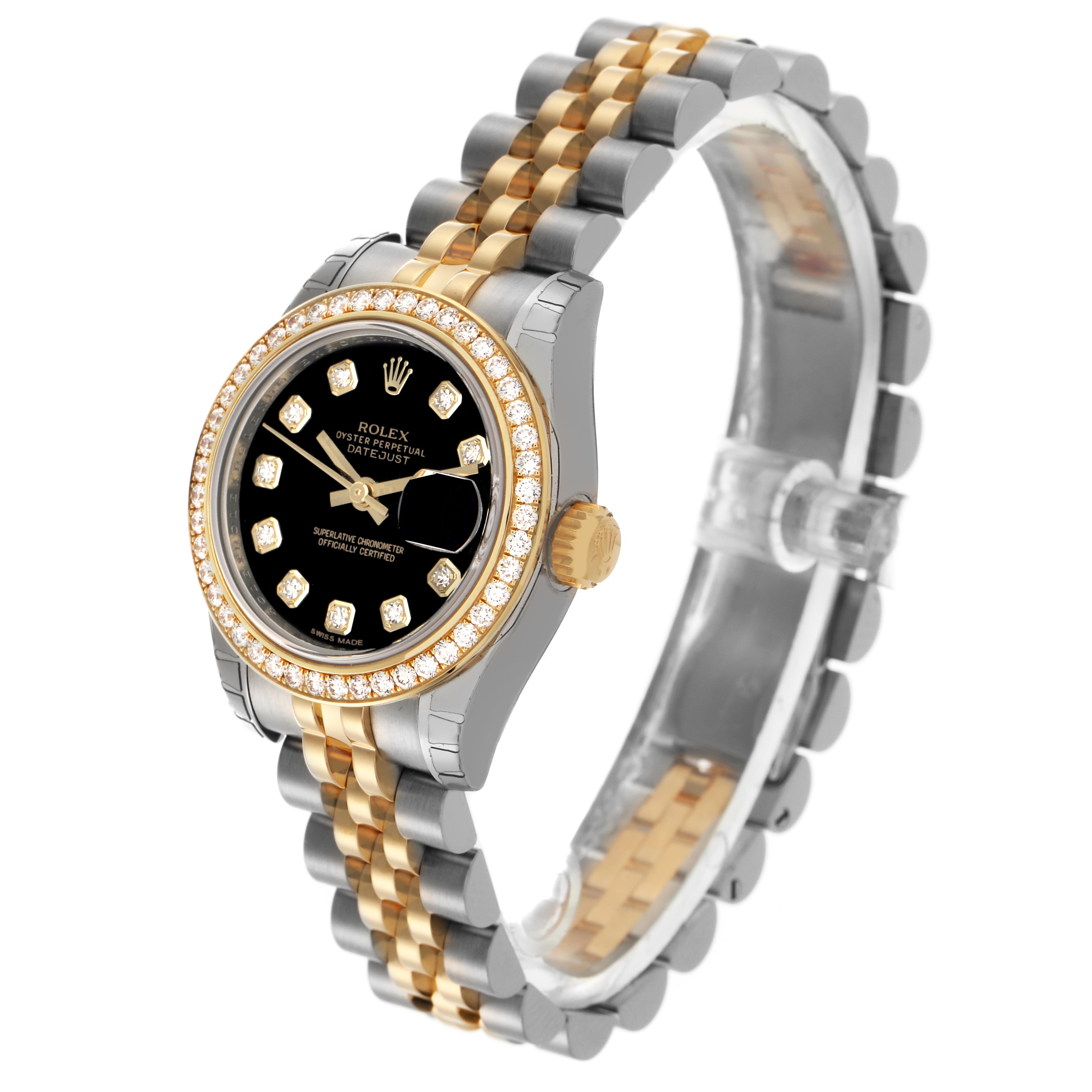 The Rolex Datejust 179383 Women
s Steel and Gold (two tone) Black Dial 179383 Women
s Steel and Gold (two tone) Black Dial watch is displayed at a slight angle, showing the dial, bezel, and two-tone bracelet.