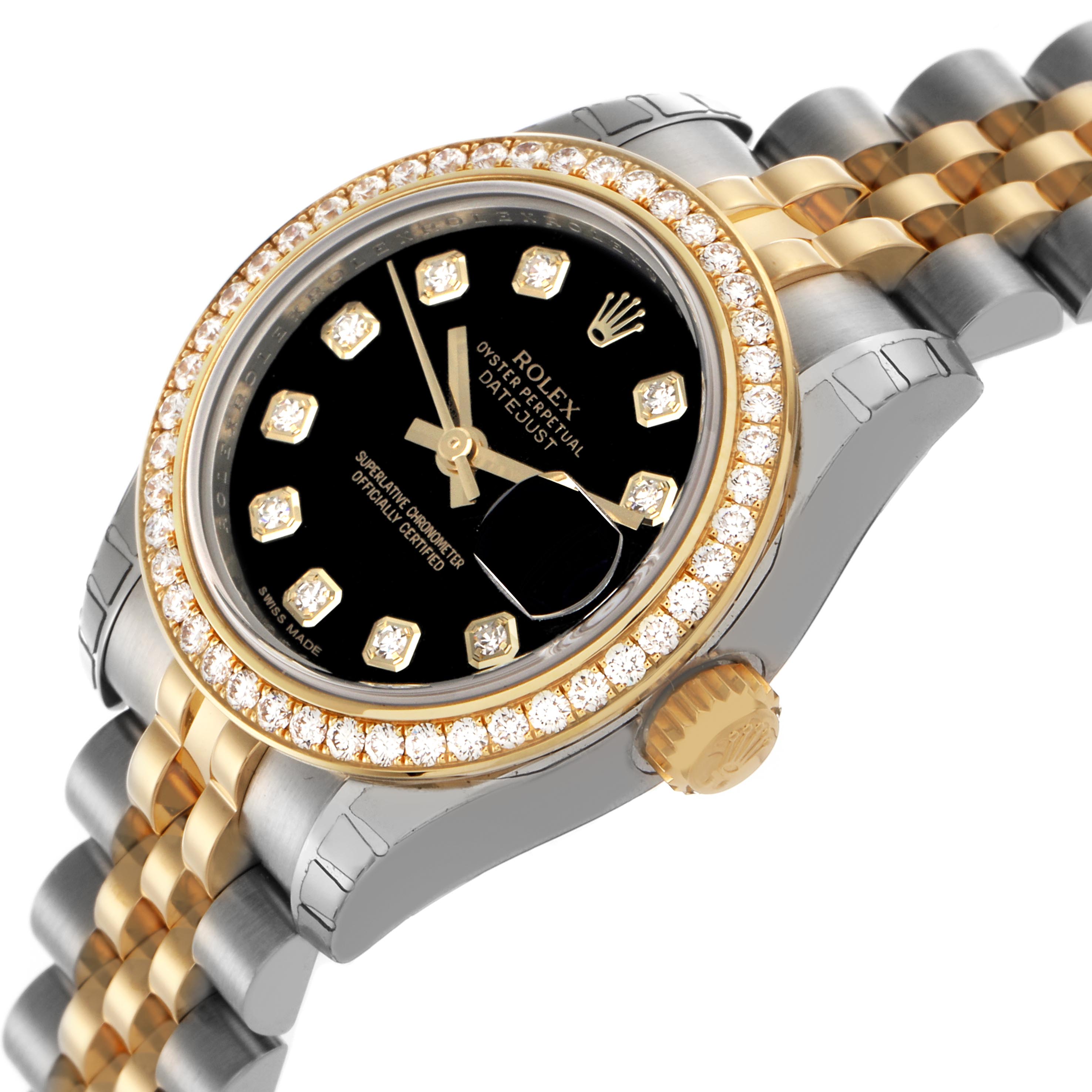 The Rolex Datejust 179383 Women
s Steel and Gold (two tone) Black Dial 179383 Women
s Steel and Gold (two tone) Black Dial watch is shown at an angled view, highlighting its black dial, diamond bezel, and two-tone bracelet.