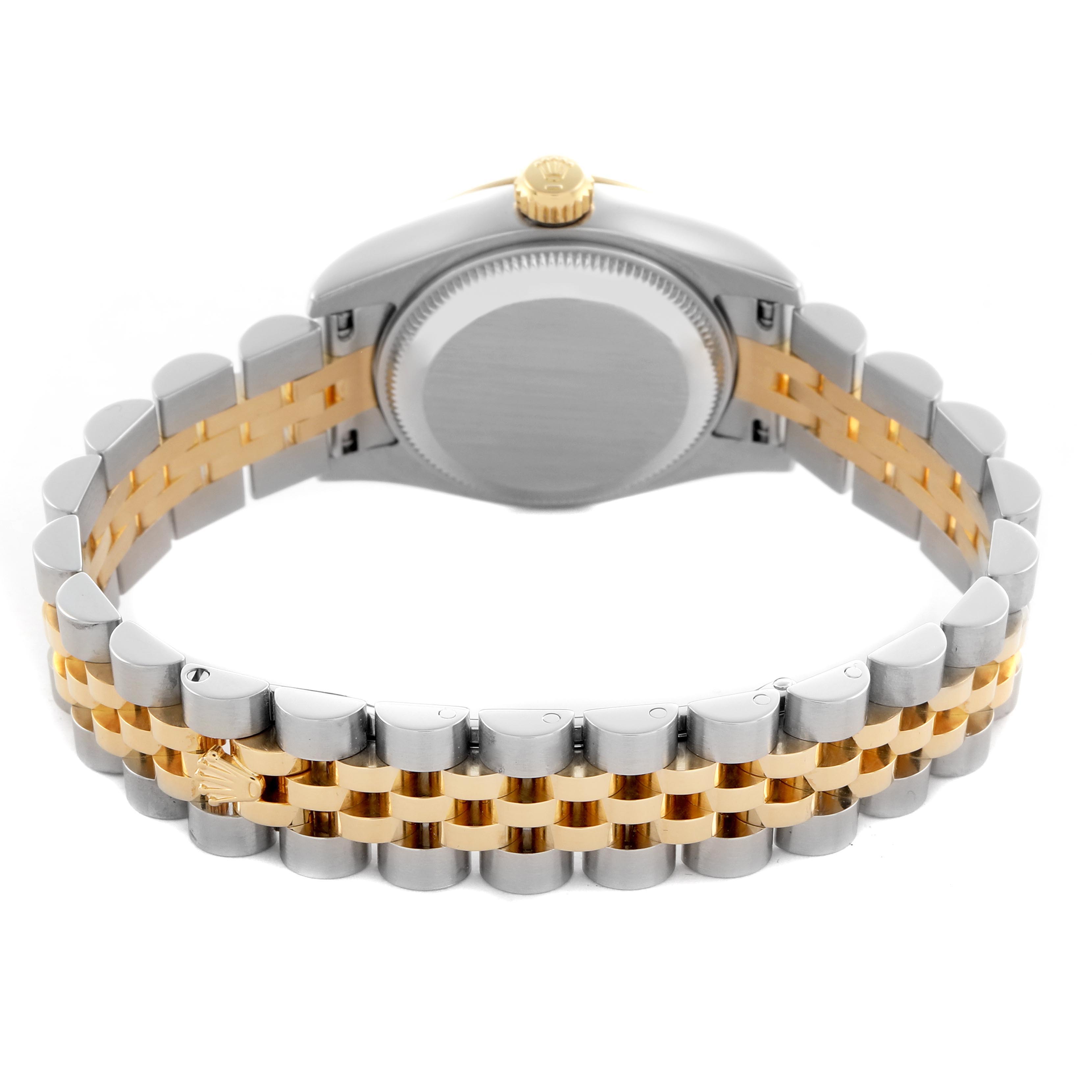 The Rolex Datejust 179173 Women
s Steel and Gold (two tone) Champagne Dial 179173 Women
s Steel and Gold (two tone) Champagne Dial watch is shown from a back angle, highlighting its case back and two-tone bracelet.