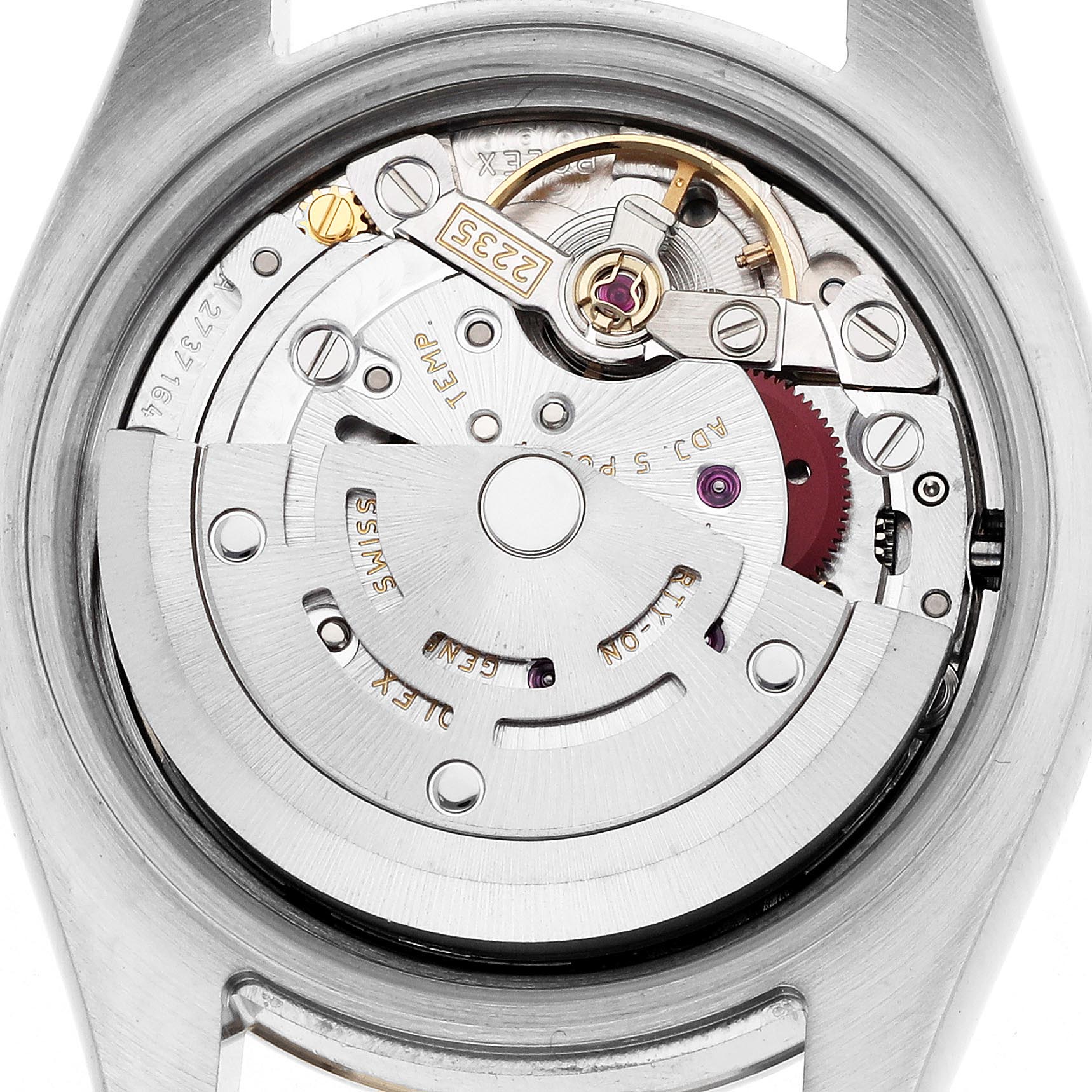 The image shows the movement of a Rolex Datejust 179173 Women
s Steel and Gold (two tone) Champagne Dial 179173 Women
s Steel and Gold (two tone) Champagne Dial watch from the back, highlighting the rotor and intricate internal components.