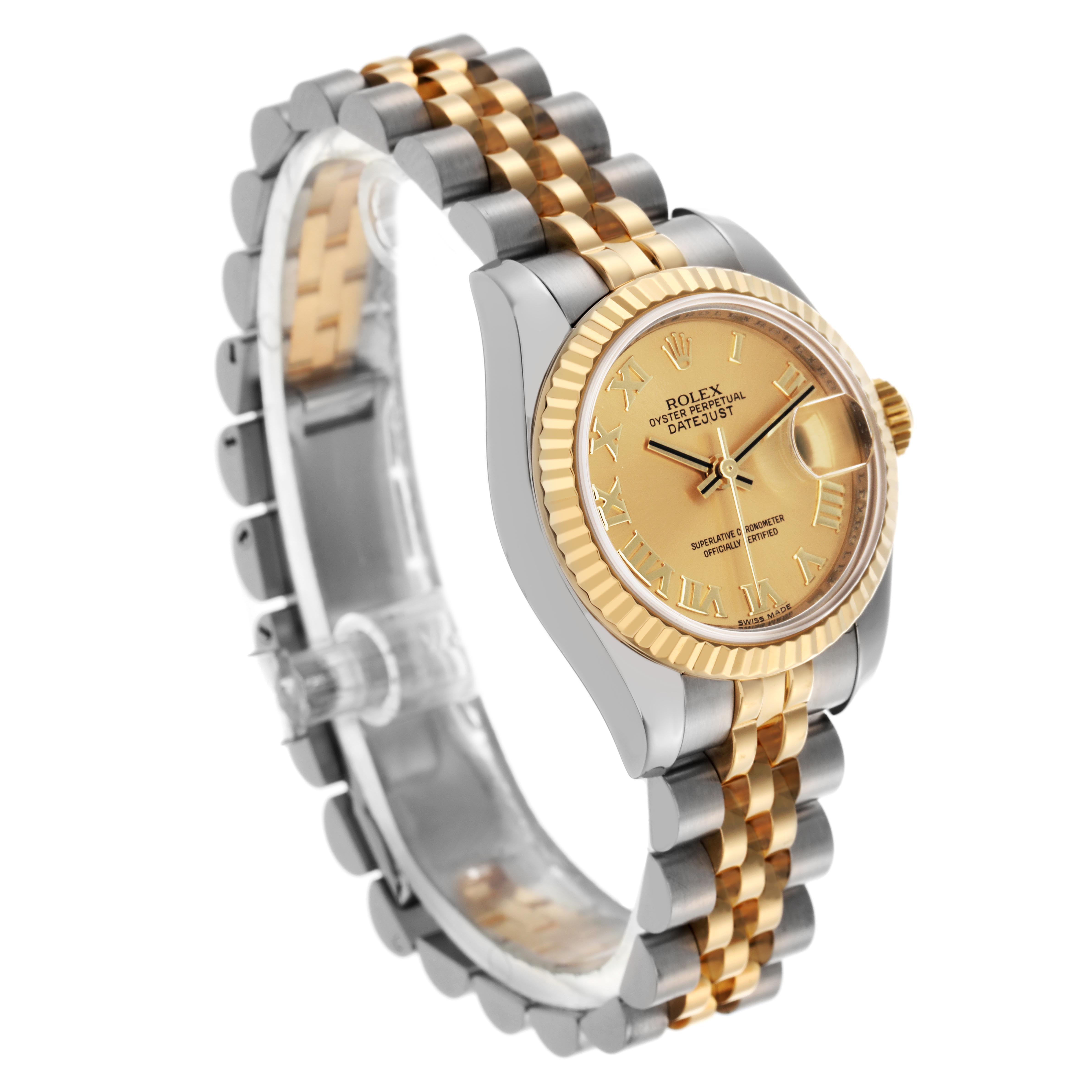 The Rolex Datejust 179173 Women
s Steel and Gold (two tone) Champagne Dial 179173 Women
s Steel and Gold (two tone) Champagne Dial watch is shown at a three-quarter angle, displaying the face, fluted bezel, and two-tone jubilee bracelet.