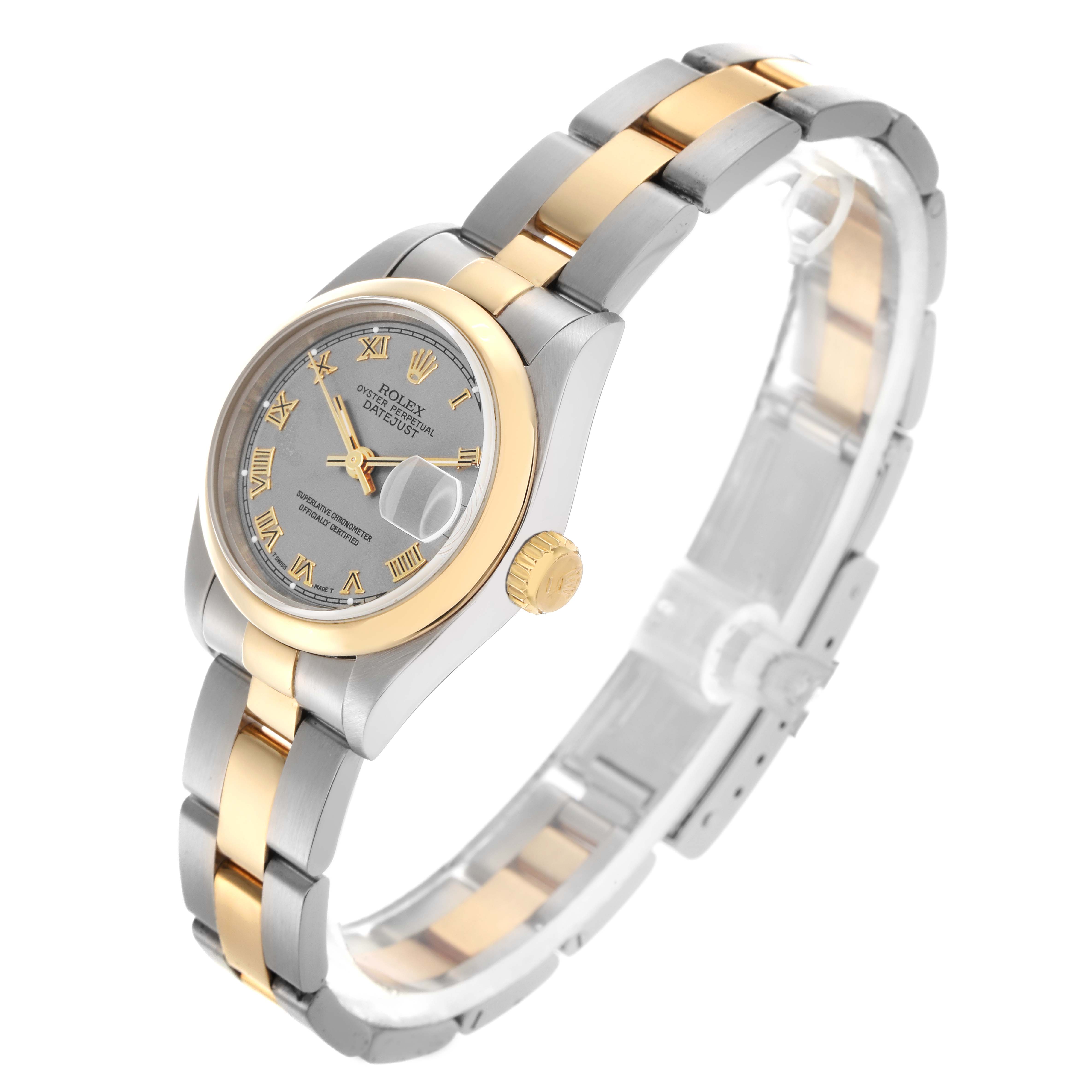 The Rolex Datejust 69163 Women
s Steel and Gold (two tone) Grey Dial 69163 Women
s Steel and Gold (two tone) Grey Dial watch is shown at a slight angled profile, highlighting the dial, bezel, crown, and two-tone bracelet.