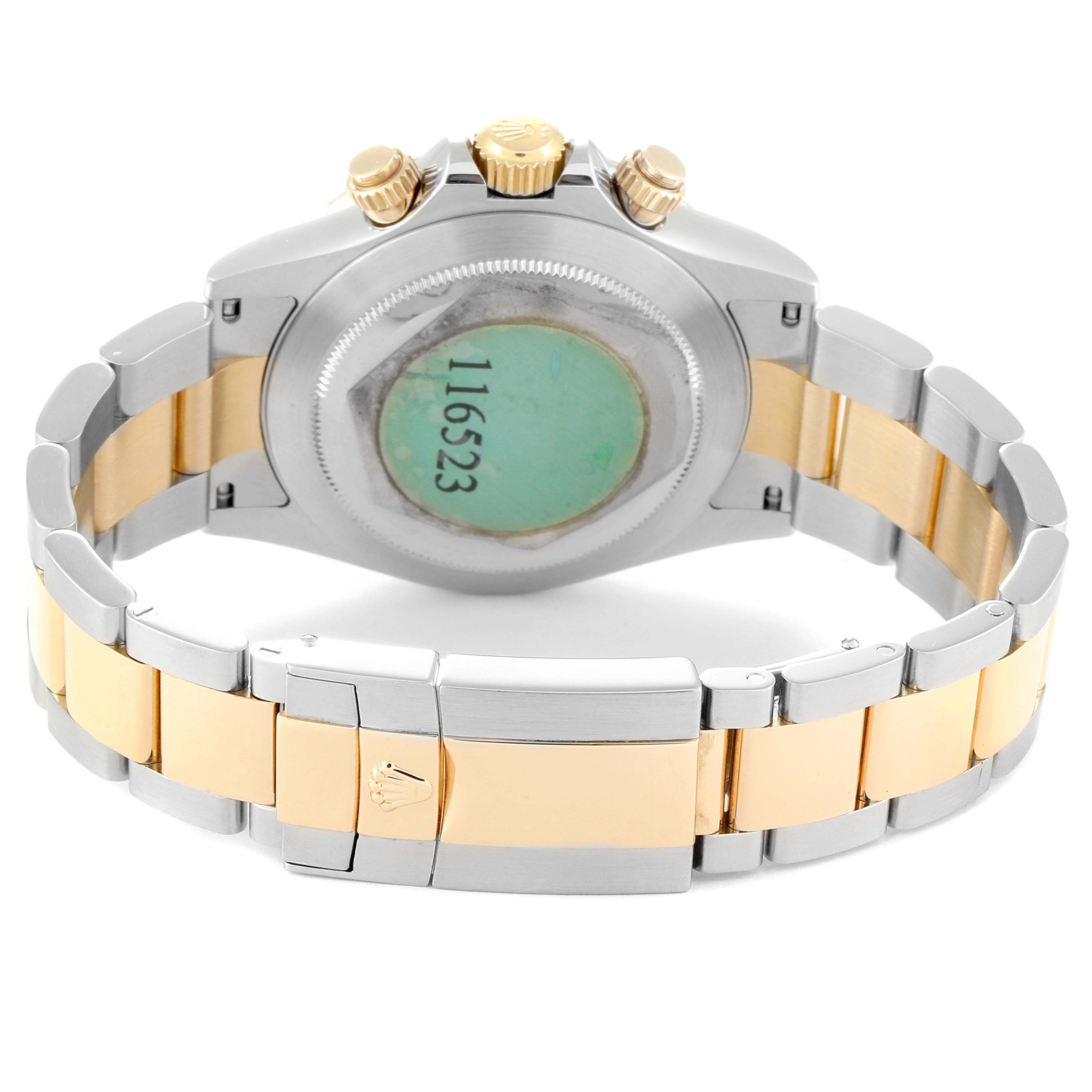 This image shows the back view of a Rolex Daytona 116523 Men
s Steel and Gold (two tone) Champagne Dial 116523 Men
s Steel and Gold (two tone) Champagne Dial watch, highlighting the bracelet and clasp.