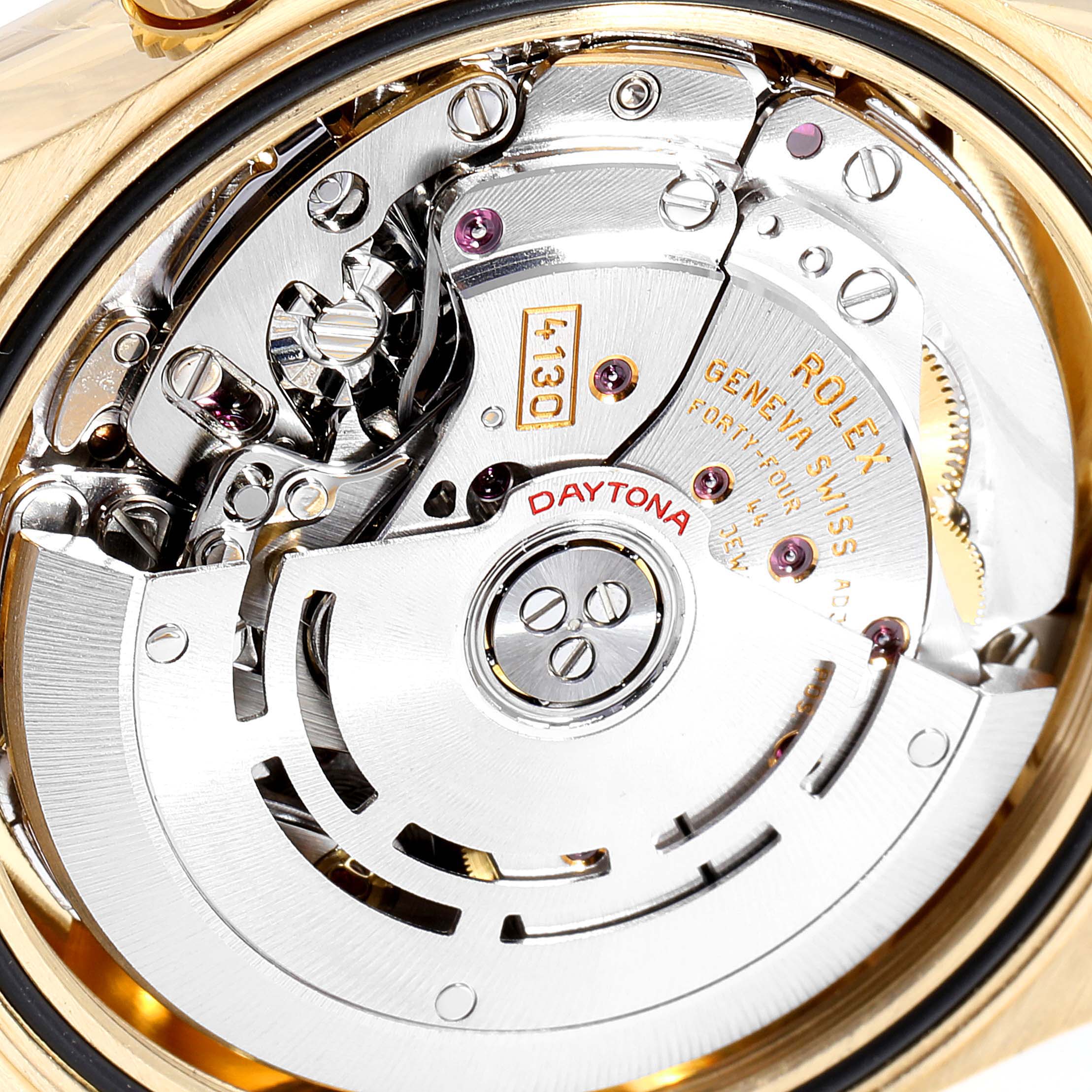 The image shows the intricate internal movement of a Rolex Daytona 116518 Men's Yellow Gold Mother of Pearl Dial 116518 Men's Yellow Gold Mother of Pearl Dial watch from a close-up, rear angle.