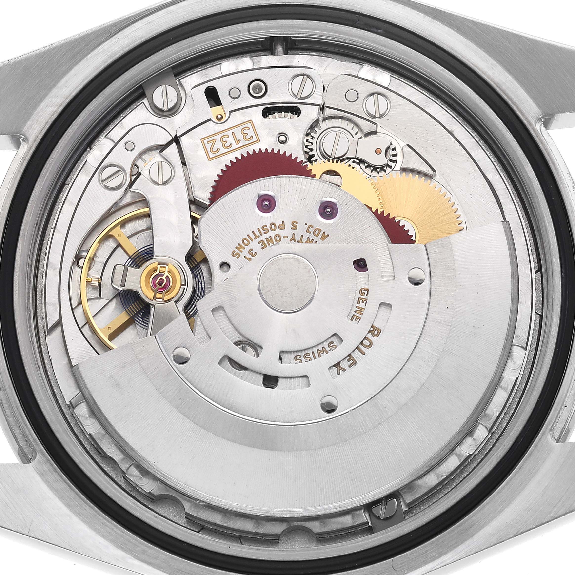 The image shows the movement of a Rolex Explorer 214270 Men
s Stainless Steel Black Dial 214270 Men
s Stainless Steel Black Dial watch from a top-down angle, highlighting gears and the rotor.