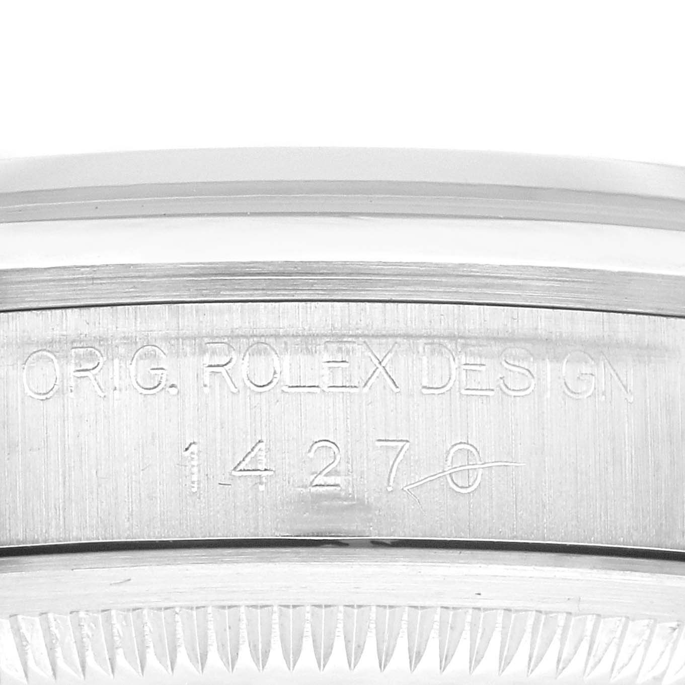 This image shows a close-up of the engraved case side of a Rolex Explorer 14270 Men
s Stainless Steel Black Dial 14270 Men
s Stainless Steel Black Dial watch, highlighting the model
s design details.
